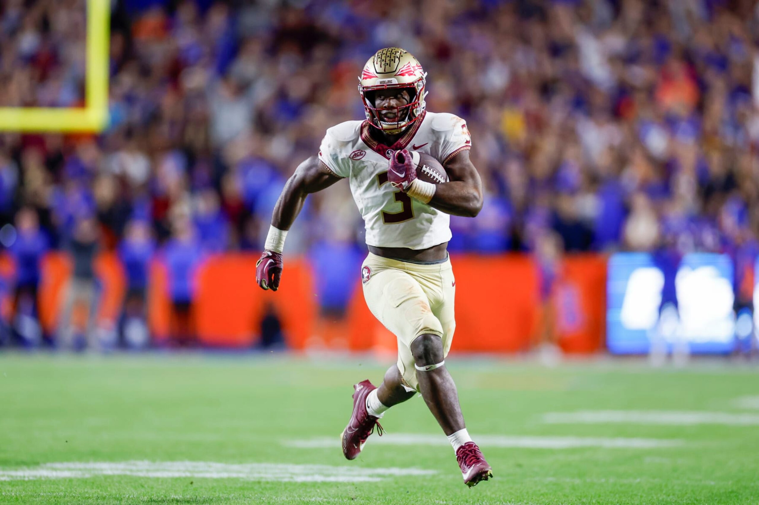 GAINESVILLE, FL - NOVEMBER 25: Florida State Seminoles running back Trey Benson (3) runs with the ball during the game between the Florida Gators and the Florida State Seminoles on November 25, 2023 at Ben Hill Griffin Stadium at Florida Field in Gainesville, Fl. (Photo by David Rosenblum/Icon Sportswire via Getty Images)