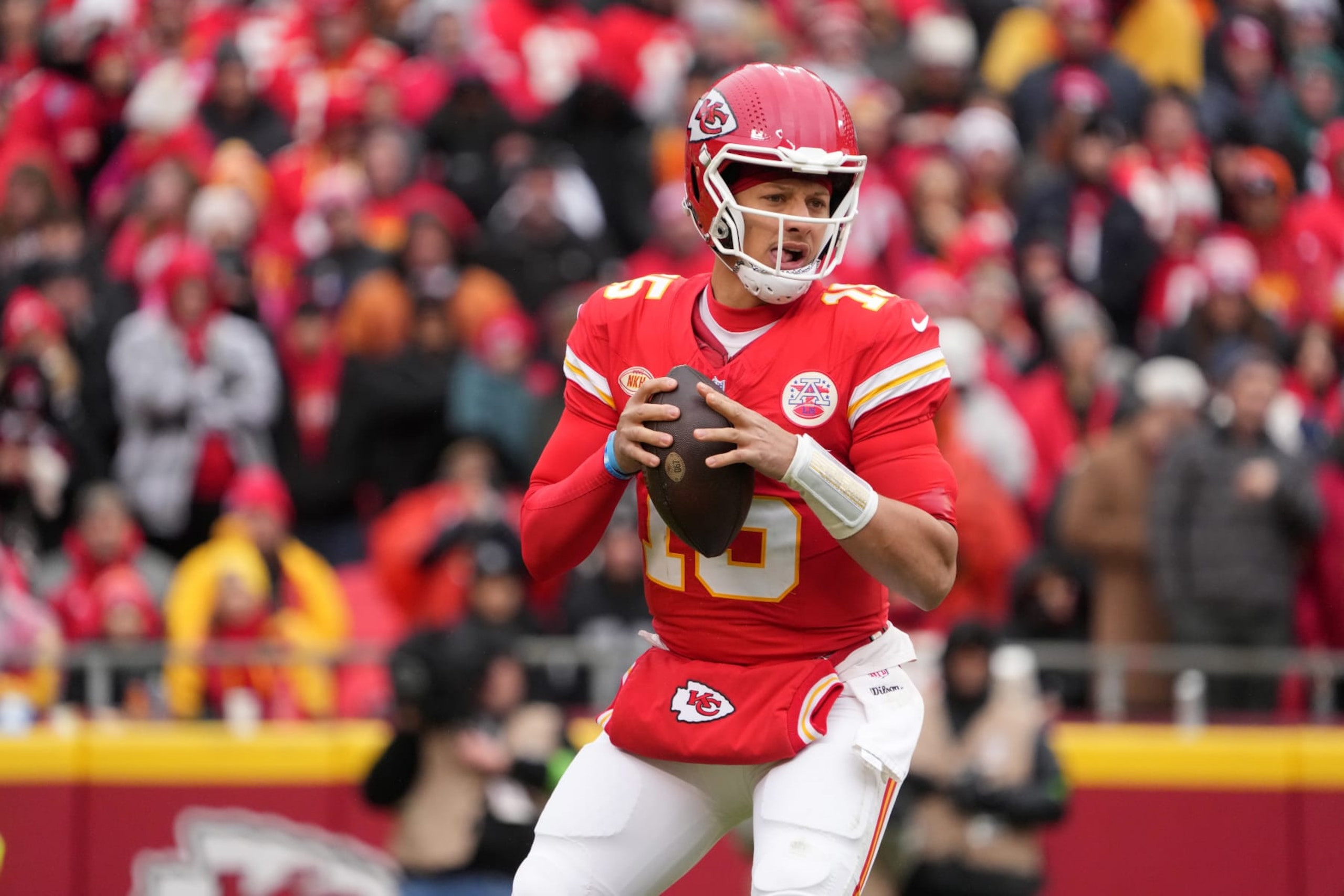 KANSAS CITY, MISSOURI - DECEMBER 25: Kansas City Chiefs quarterback Patrick Mahomes (15) throws the ball against the Las Vegas Raiders during an NFL football game on December 25, 2023 in Kansas City, Missouri. The Raiders defeated the Chiefs 20-14.  (Photo by Kirby Lee/Getty Images)