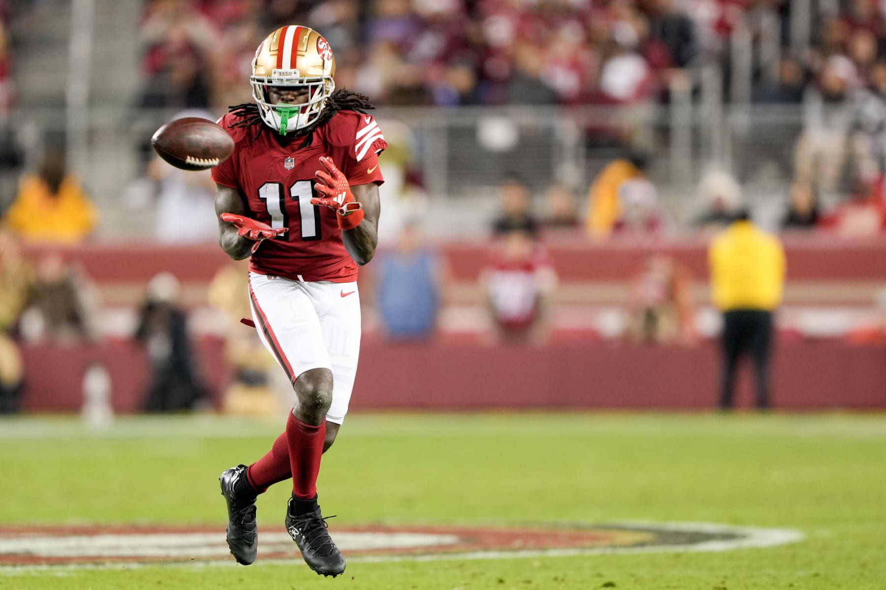 SANTA CLARA, CALIFORNIA - DECEMBER 25: Brandon Aiyuk #11 of the San Francisco 49ers catches a pass during the fourth quarter against the Baltimore Ravens at Levi's Stadium on December 25, 2023 in Santa Clara, California. (Photo by Thearon W. Henderson/Getty Images)