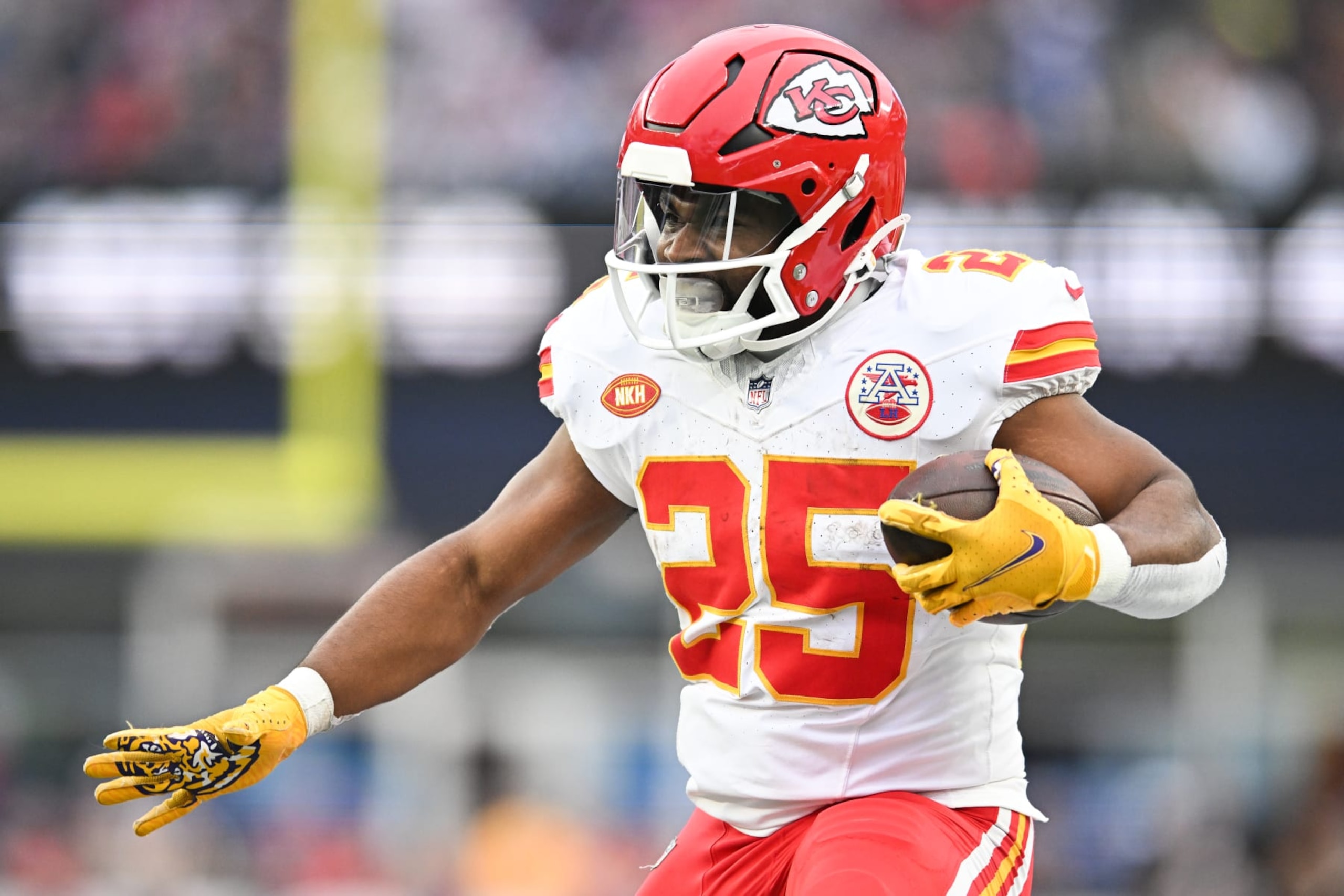 FOXBORO, MA - DECEMBER 17: Clyde Edwards-Helaire #25 of the Kansas City Chiefs runs with the football during the second half against the New England Patriots at Gillette Stadium on December 17, 2023 in Foxboro, Massachusetts. (Photo by Kathryn Riley/Getty Images)