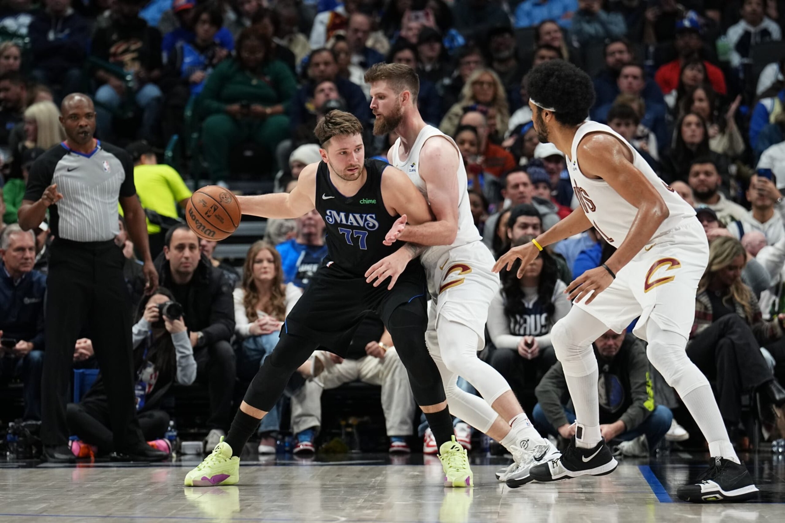 DALLAS, TX - DECEMBER 27: Luka Doncic #77 of the Dallas Mavericks handles the ball during the game against the Cleveland Cavaliers on December 27, 2023 at the American Airlines Center in Dallas, Texas. NOTE TO USER: User expressly acknowledges and agrees that, by downloading and or using this photograph, User is consenting to the terms and conditions of the Getty Images License Agreement. Mandatory Copyright Notice: Copyright 2023 NBAE (Photo by Glenn James/NBAE via Getty Images) DALLAS, TX - DECEMBER 27: Luka Doncic #77 of the Dallas Mavericks handles the ball during the game against the Cleveland Cavaliers on December 27, 2023 at the American Airlines Center in Dallas, Texas. NOTE TO USER: User expressly acknowledges and agrees that, by downloading and or using this photograph, User is consenting to the terms and conditions of the Getty Images License Agreement. Mandatory Copyright Notice: Copyright 2023 NBAE (Photo by Glenn James/NBAE via Getty Images)