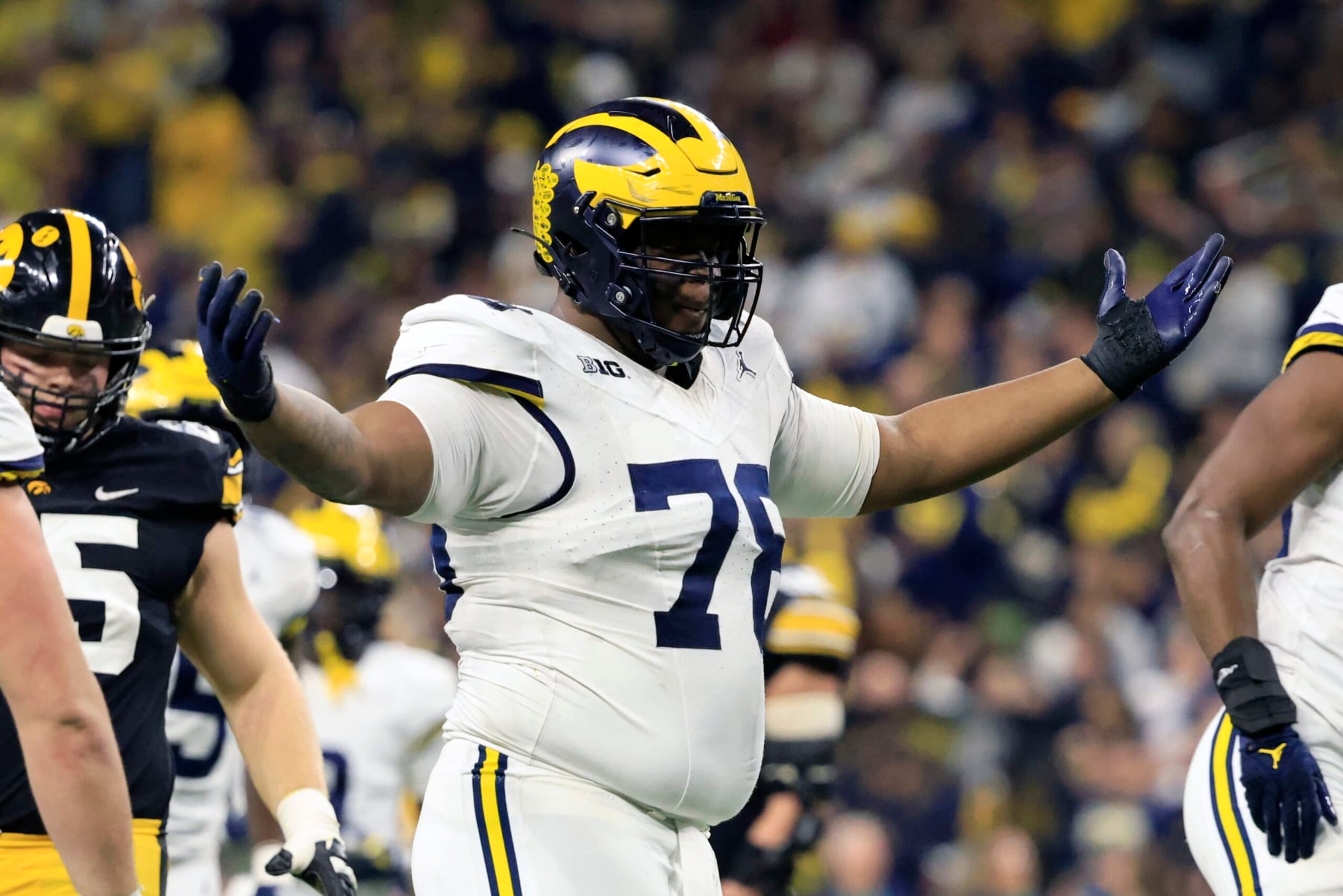INDIANAPOLIS, INDIANA - DECEMBER 02: Kenneth Grant #78 of the Michigan Wolverines reacts after a play in the game against the Iowa Hawkeyes during the Big Ten Championship at Lucas Oil Stadium on December 02, 2023 in Indianapolis, Indiana. (Photo by Justin Casterline/Getty Images)