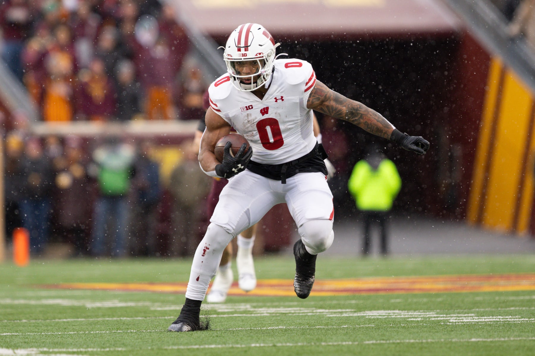 MINNEAPOLIS, MN - NOVEMBER 25: Wisconsin Badgers running back Braelon Allen (0) runs with the ball during the college football game between the Wisconsin Badgers and the Minnesota Golden Gophers on November 25th, 2023, at Huntington Bank Stadium in Minneapolis, MN. (Photo by Bailey Hillesheim/Icon Sportswire via Getty Images)