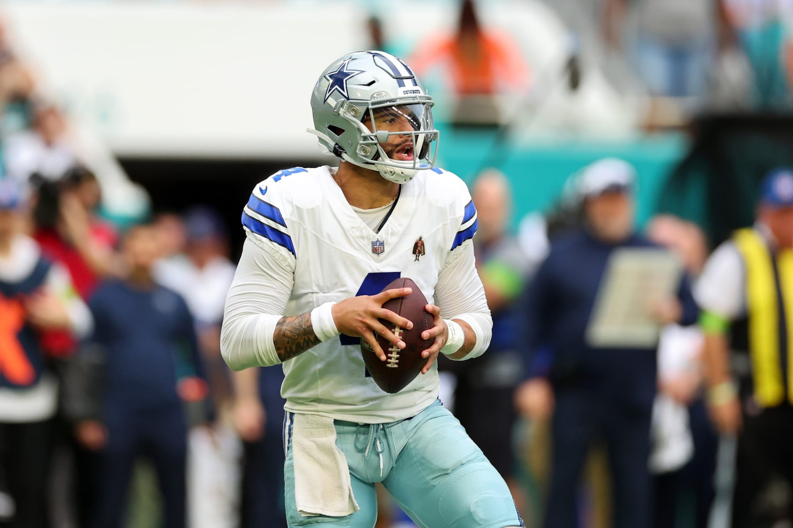 MIAMI GARDENS, FLORIDA - DECEMBER 24: Dak Prescott #4 of the Dallas Cowboys looks to pass during a game against the Miami Dolphins at Hard Rock Stadium on December 24, 2023 in Miami Gardens, Florida.  The Dolphins defeated the Cowboys 22-20. (Photo by Stacy Revere/Getty Images)