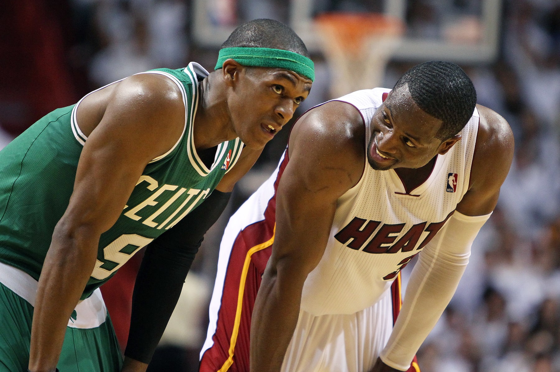 MIAMI, FL - JUNE 9: The Celtics Rajon Rondo, left, and Miami's Dwyane Wade had a conversation after they received matching technical fouls late in the first half. The Boston Celtics visited the Miami Heat for game seven of the NBA Eastern Conference Finals at the American Airlines Arena. (Photo by Jim Davis/The Boston Globe via Getty Images)