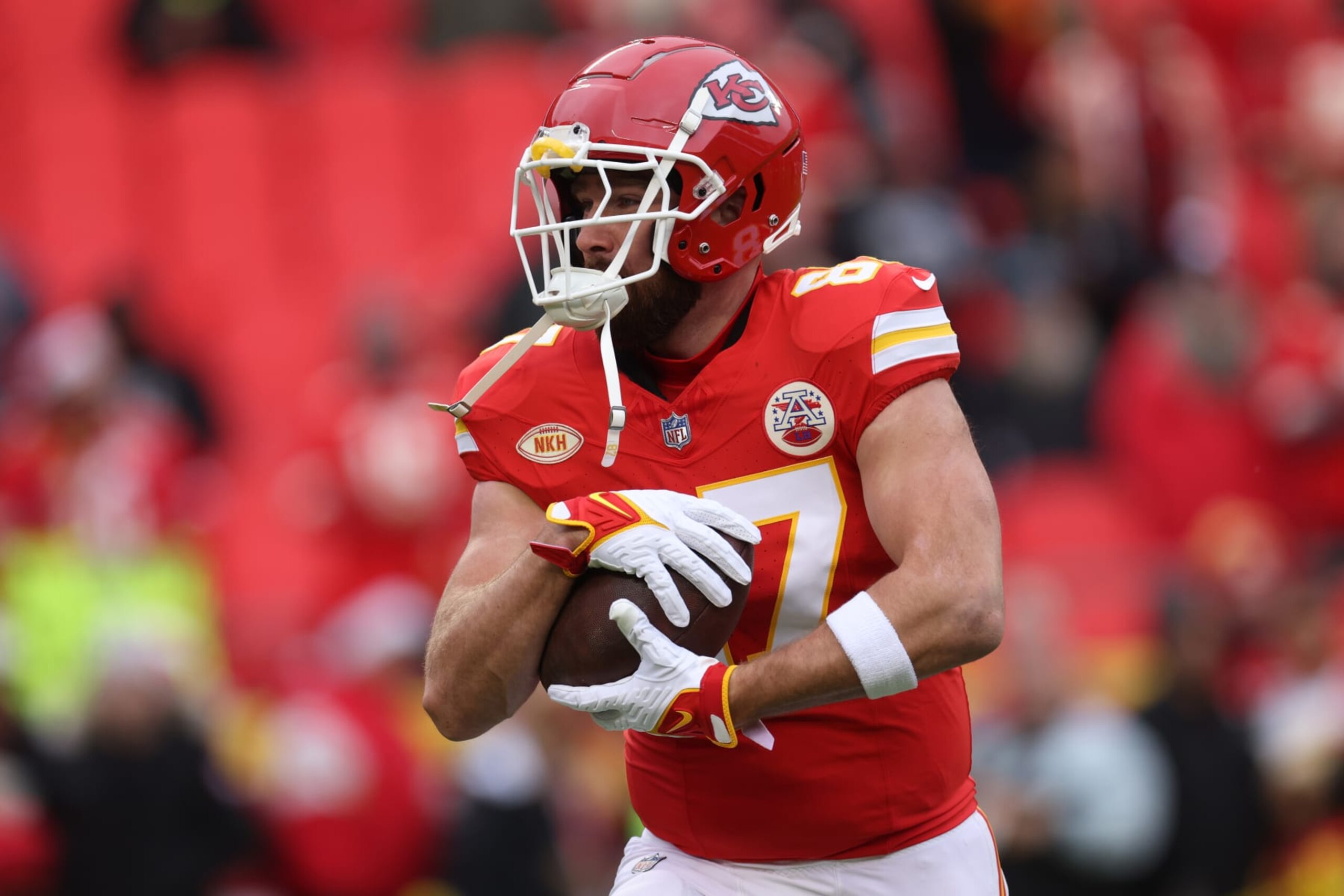 KANSAS CITY, MISSOURI - DECEMBER 25: Travis Kelce #87 of the Kansas City Chiefs warms up prior to a game against the Las Vegas Raiders at GEHA Field at Arrowhead Stadium on December 25, 2023 in Kansas City, Missouri. (Photo by Jamie Squire/Getty Images)