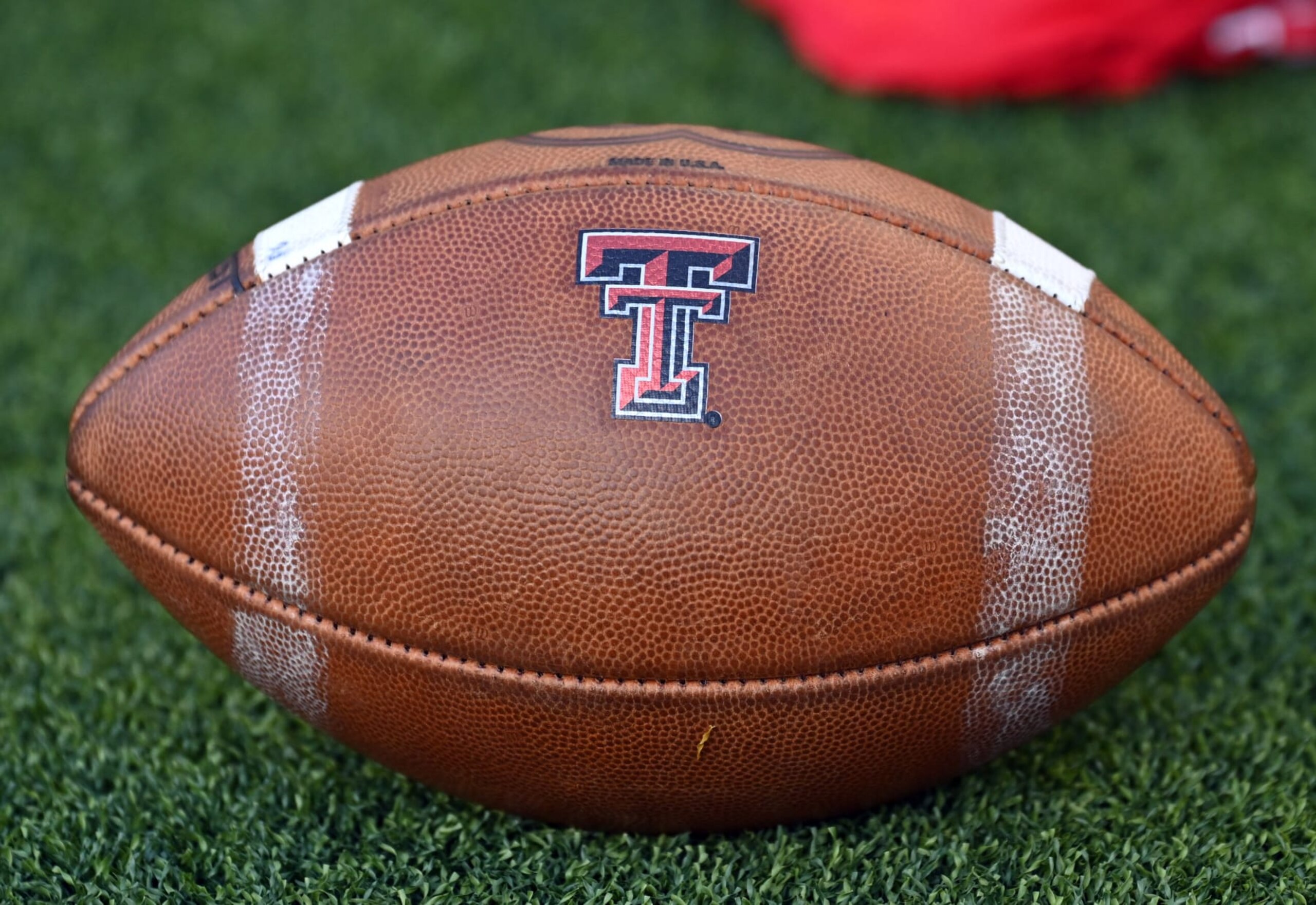 WACO, TX - OCTOBER 07: A Texas Tech Red Raiders logo is embosee on a ball during game between the Texas Tech Red Raiders and the Baylor Bears on October 7, 2023 at McLane Stadium in Waco, TX. (Photo by John Rivera/Icon Sportswire via Getty Images)