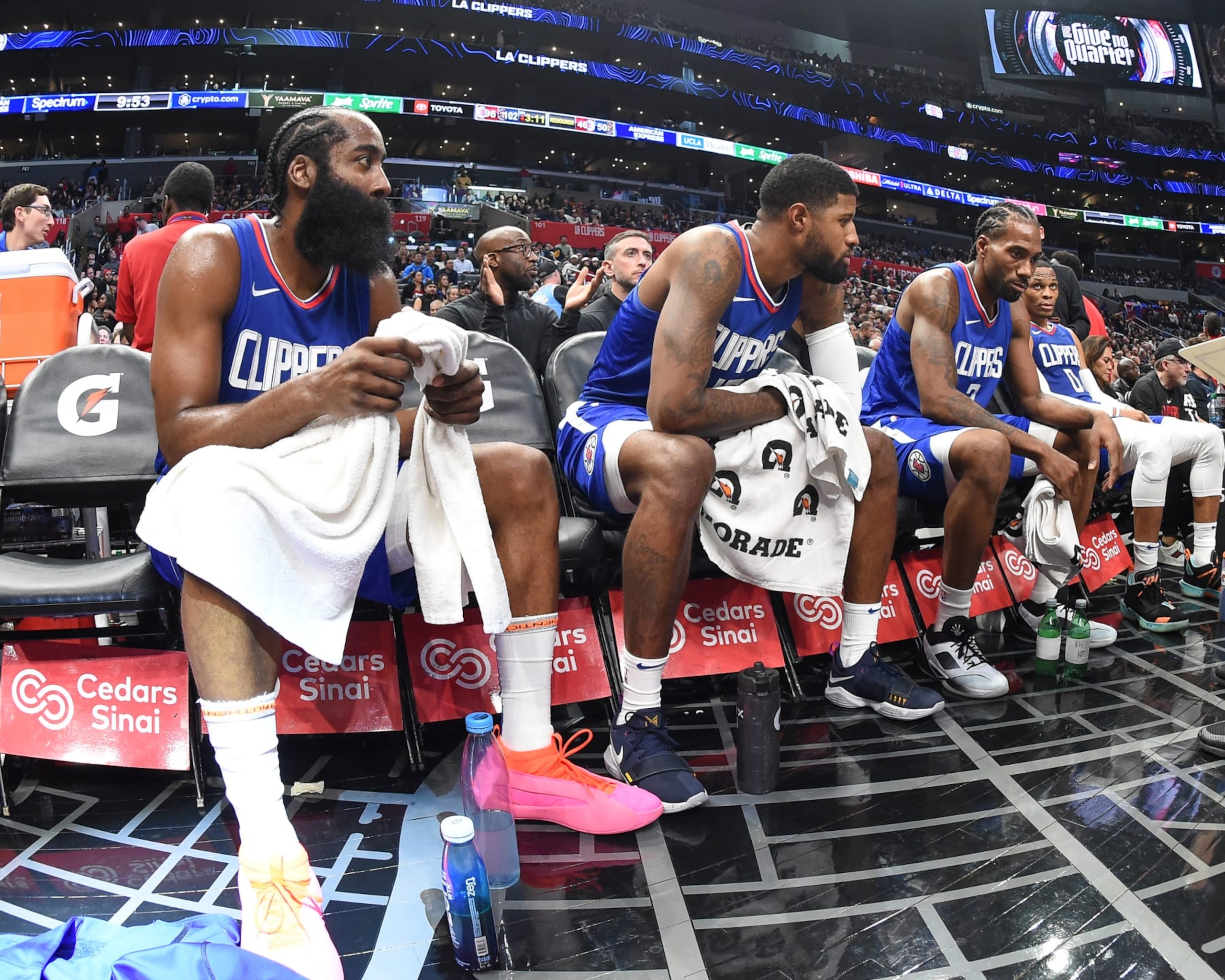 LOS ANGELES, CA - NOVEMBER 27:  James Harden #1 of the LA Clippers Paul George #13 of the LA Clippers Kawhi Leonard #2 of the LA Clippers & Kawhi Leonard #2 of the LA Clippers looks on during the game on November 27, 2023 at Crypto.Com Arena in Los Angeles, California. NOTE TO USER: User expressly acknowledges and agrees that, by downloading and/or using this Photograph, user is consenting to the terms and conditions of the Getty Images License Agreement. Mandatory Copyright Notice: Copyright 2023 NBAE (Photo by Andrew D. Bernstein/NBAE via Getty Images)