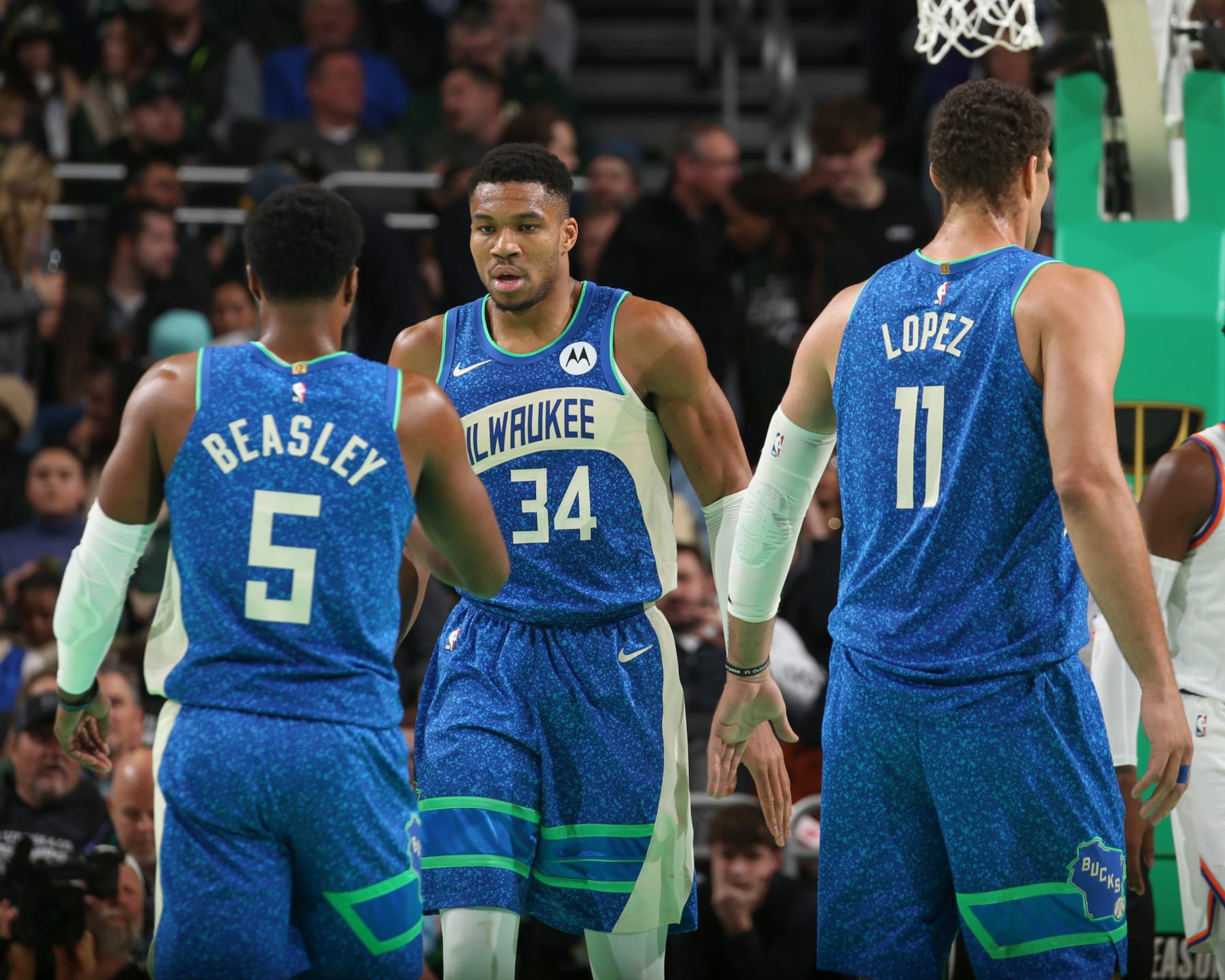 MILWAUKEE, WI - DECEMBER 5:  Giannis Antetokounmpo #34 of the Milwaukee Bucks Malik Beasley #5 of the Milwaukee Bucks Brook Lopez #11 of the Milwaukee Bucks high five during the game  during the quarter finals of the In-Season Tournament on December 5, 2023 at the Fiserv Forum Center in Milwaukee, Wisconsin. NOTE TO USER: User expressly acknowledges and agrees that, by downloading and or using this Photograph, user is consenting to the terms and conditions of the Getty Images License Agreement. Mandatory Copyright Notice: Copyright 2023 NBAE (Photo by Gary Dineen/NBAE via Getty Images).