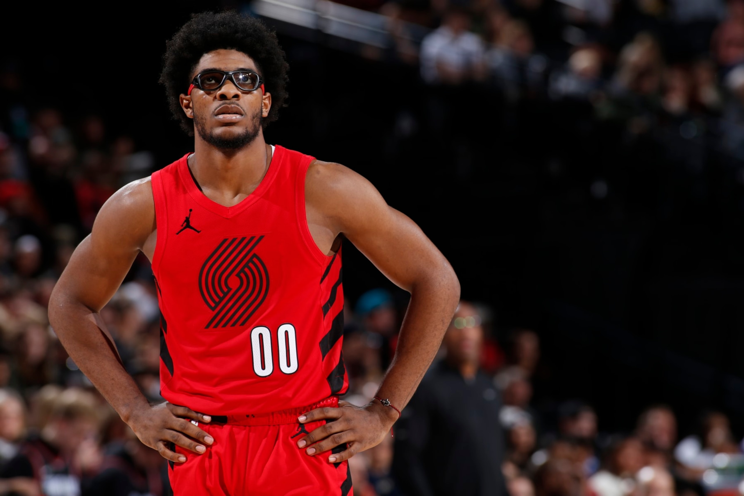 PORTLAND, OR - DECEMBER 26: Scoot Henderson #00 of the Portland Trail Blazers looks on during the game against the Sacramento Kings on December 26, 2023 at the Moda Center Arena in Portland, Oregon. NOTE TO USER: User expressly acknowledges and agrees that, by downloading and or using this photograph, user is consenting to the terms and conditions of the Getty Images License Agreement. Mandatory Copyright Notice: Copyright 2023 NBAE (Photo by Cameron Browne/NBAE via Getty Images)