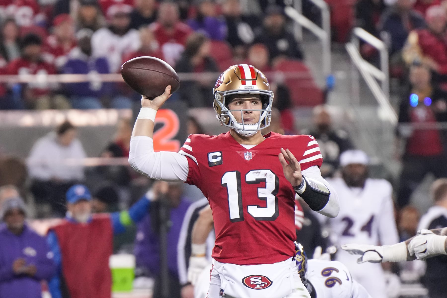 SANTA CLARA, CALIFORNIA - DECEMBER 25: Brock Purdy #13 of the San Francisco 49ers looks to pass during the first half against the Baltimore Ravens at Levi's Stadium on December 25, 2023 in Santa Clara, California. (Photo by Loren Elliott/Getty Images)