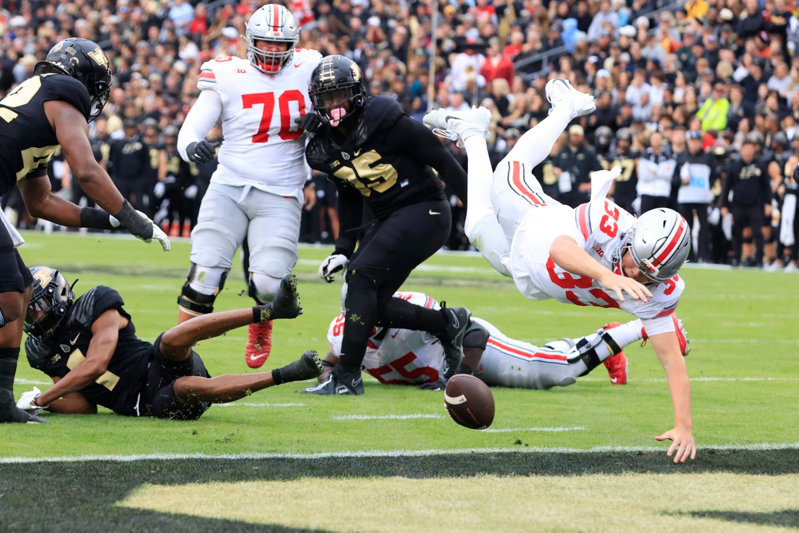 WEST LAFAYETTE, INDIANA - OCTOBER 14: Devin Brown #33 of the Ohio State Buckeyes fumbles the ball in the end zone during the first half against the Purdue Boilermakers at Ross-Ade Stadium on October 14, 2023 in West Lafayette, Indiana. (Photo by Justin Casterline/Getty Images)