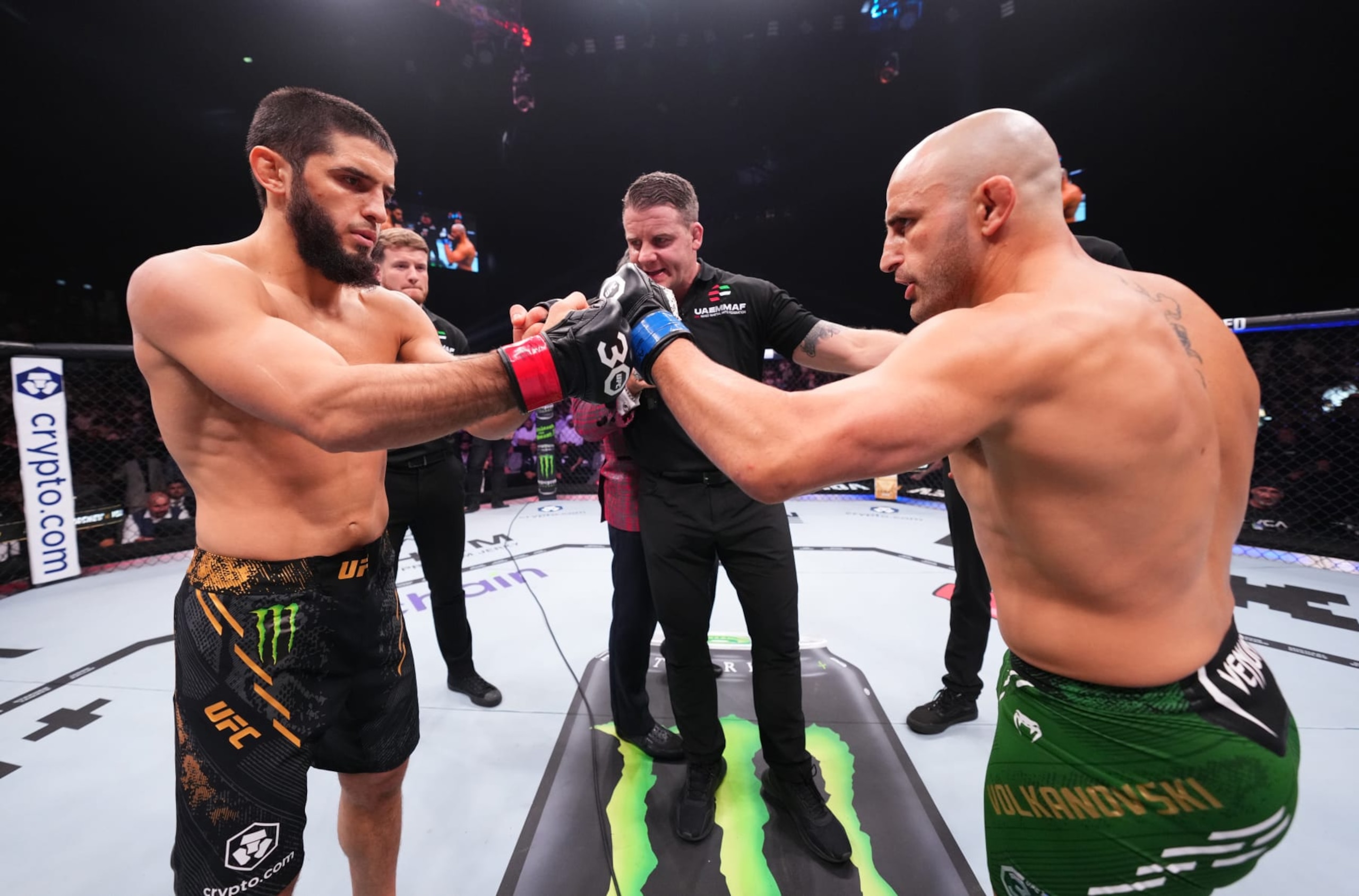 Opponents Islam Makhachev of Russia and Alexander Volkanovski of Australia face off prior to their rematch in October. 