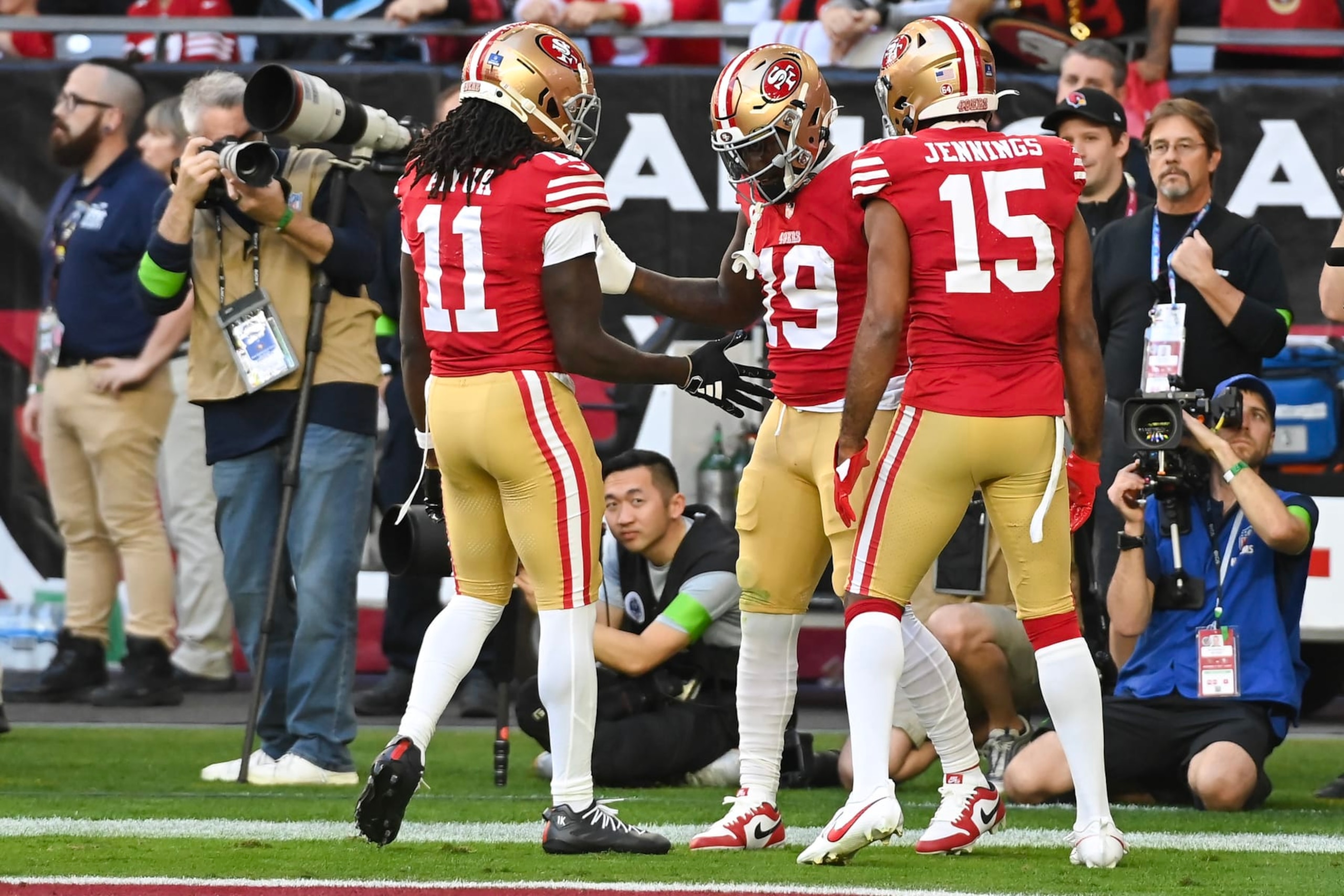 GLENDALE, ARIZONA - DECEMBER 17: Deebo Samuel #19 of the San Francisco 49ers celebrates a touchdown during the first quarter of a game against the Arizona Cardinals at State Farm Stadium on December 17, 2023 in Glendale, Arizona. (Photo by Norm Hall/Getty Images)