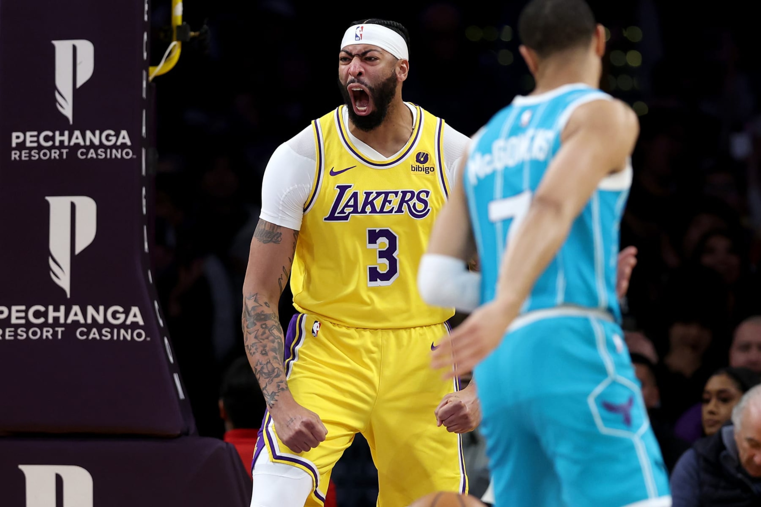LOS ANGELES, CALIFORNIA - DECEMBER 28: Anthony Davis #3 of the Los Angeles Lakers reacts after a dunk during the first half of a game against the Charlotte Hornets at Crypto.com Arena on December 28, 2023 in Los Angeles, California. NOTE TO USER: User expressly acknowledges and agrees that, by downloading and or using this photograph, User is consenting to the terms and conditions of the Getty Images License Agreement.  (Photo by Sean M. Haffey/Getty Images)