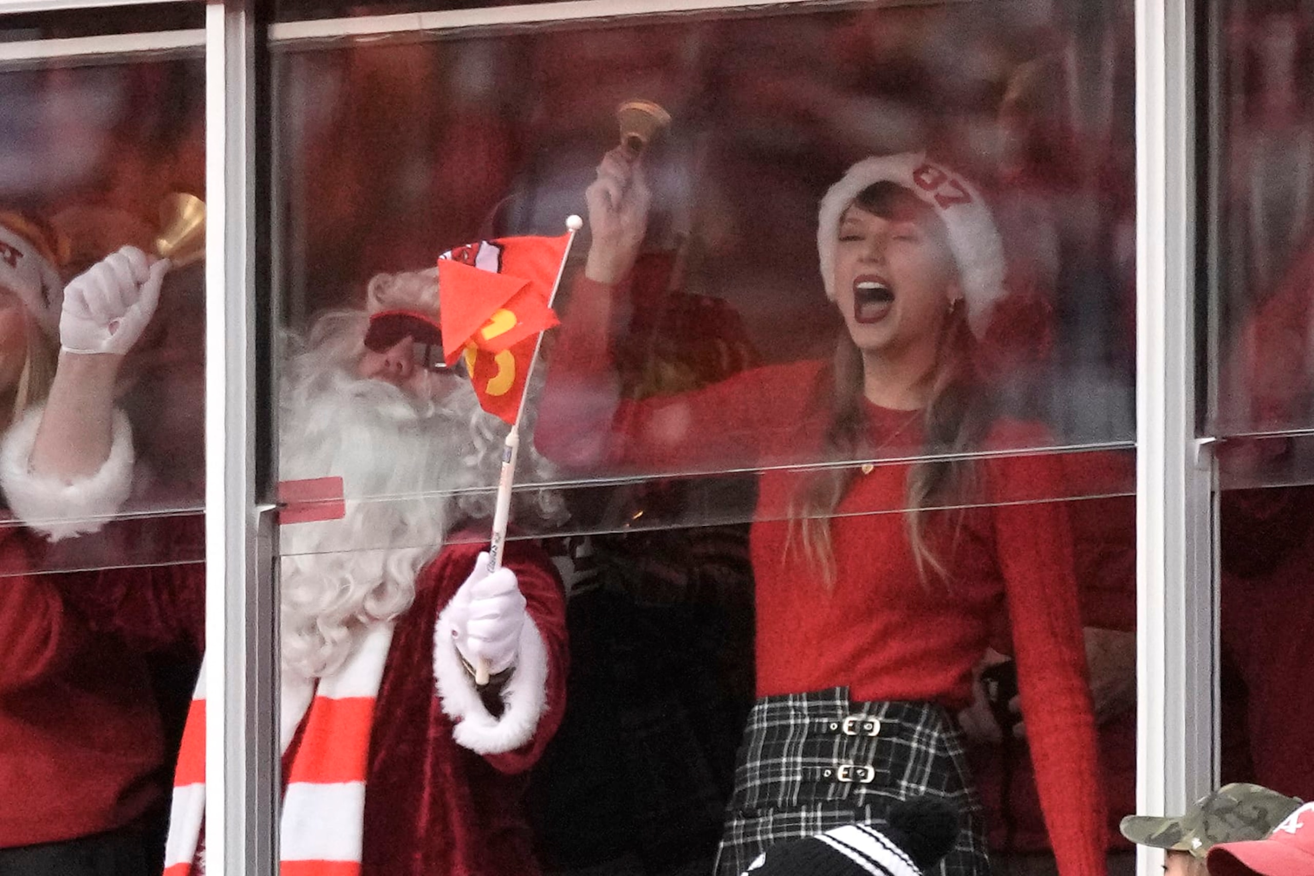 Taylor Swift watches during the first half of an NFL football game between the Kansas City Chiefs and the Las Vegas Raiders Monday, Dec. 25, 2023, in Kansas City, Mo. (AP Photo/Charlie Riedel)