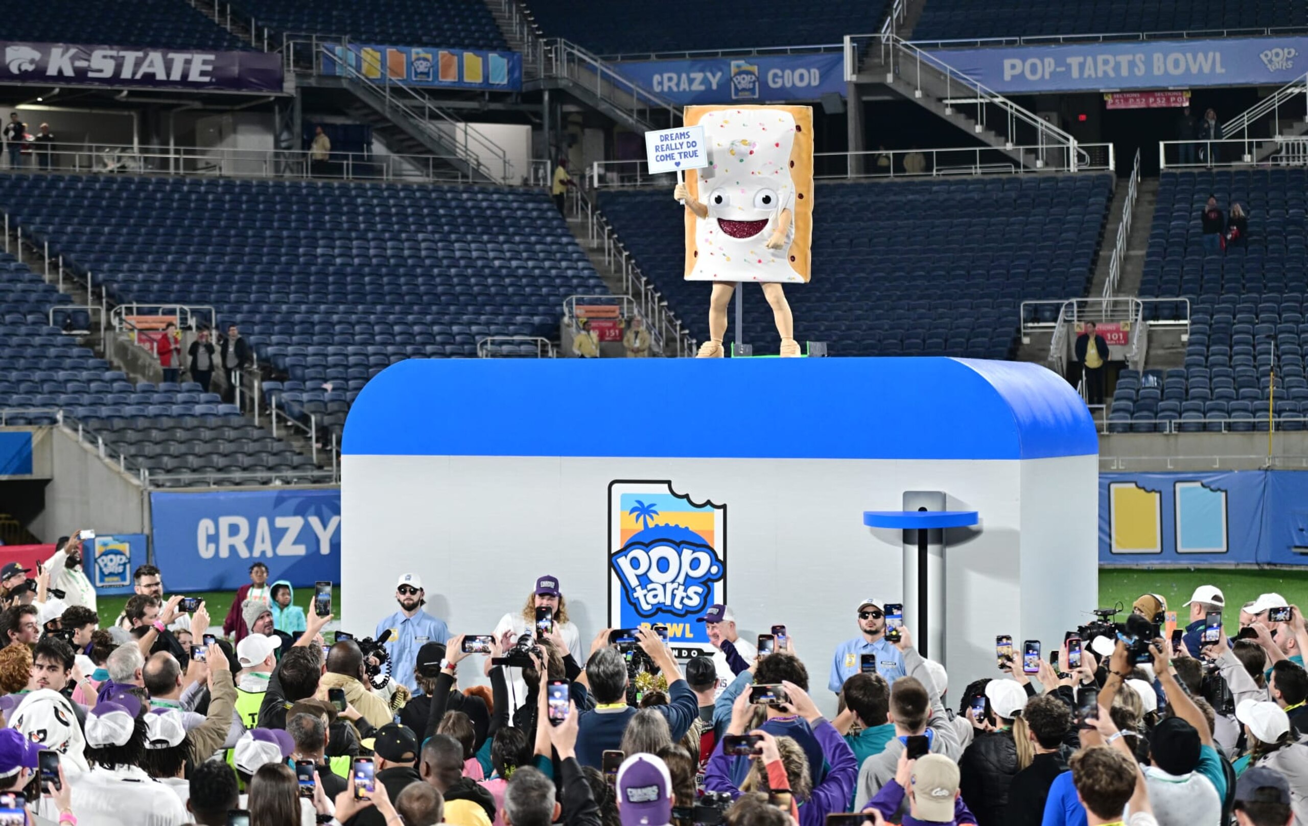 ORLANDO, FLORIDA - DECEMBER 28: The Pop-Tart mascot looks on following the 2023 Pop-Tarts Bowl at Camping World Stadium between the Kansas State Wildcats and the NC State Wolfpack on December 28, 2023 in Orlando, Florida. (Photo by Julio Aguilar/Getty Images) ORLANDO, FLORIDA - DECEMBER 28: The Pop-Tart mascot looks on following the 2023 Pop-Tarts Bowl at Camping World Stadium between the Kansas State Wildcats and the NC State Wolfpack on December 28, 2023 in Orlando, Florida. (Photo by Julio Aguilar/Getty Images)