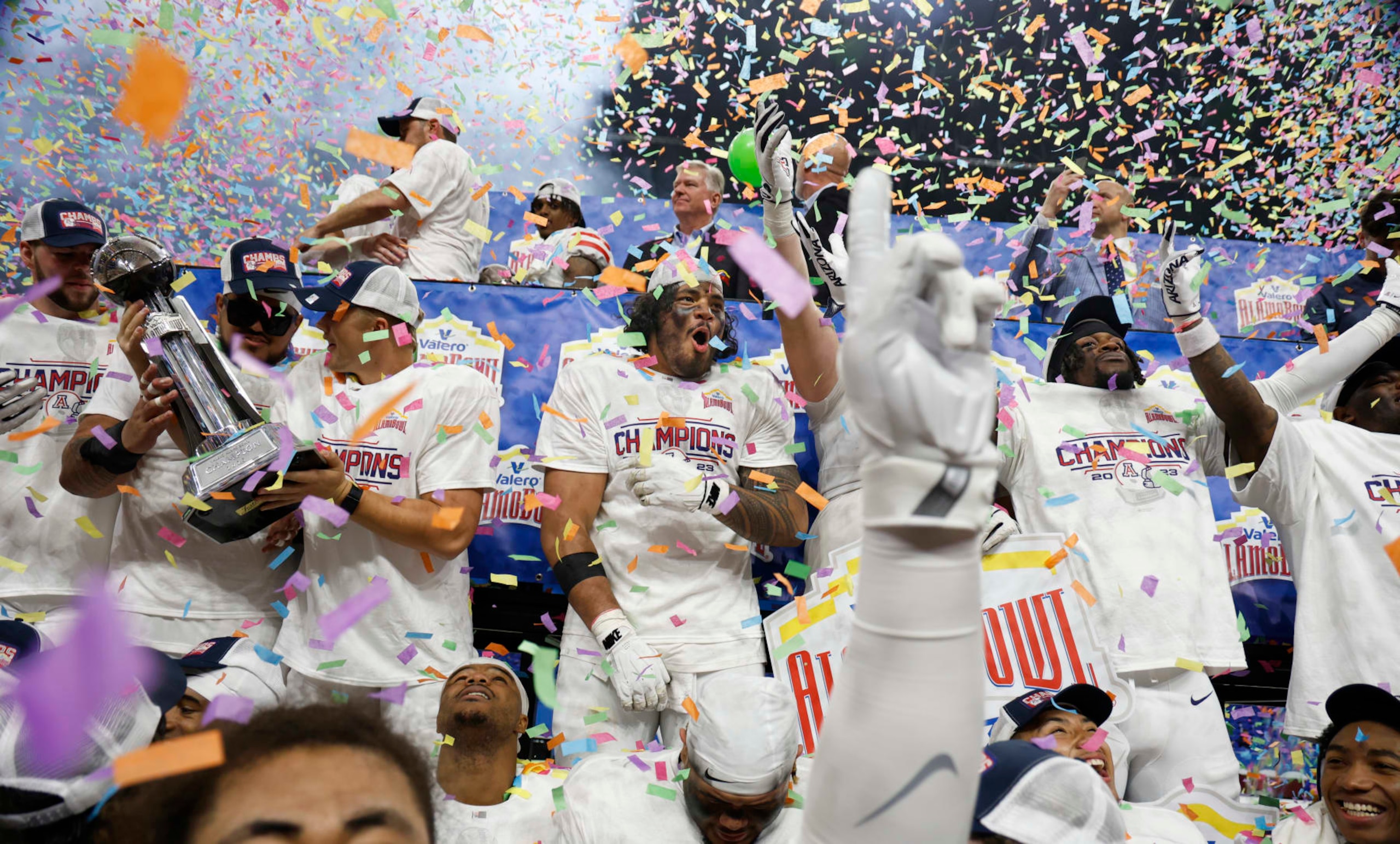 SAN ANTONIO, TX - DECEMBER 28: The Arizona Wildcats celebrate after defeating Oklahoma Sooners at the Valero Alamo Bowl at the Alamodome on December 28, 2023 in San Antonio, Texas. (Photo by Ronald Cortes/Getty Images) SAN ANTONIO, TX - DECEMBER 28: The Arizona Wildcats celebrate after defeating Oklahoma Sooners at the Valero Alamo Bowl at the Alamodome on December 28, 2023 in San Antonio, Texas. (Photo by Ronald Cortes/Getty Images)