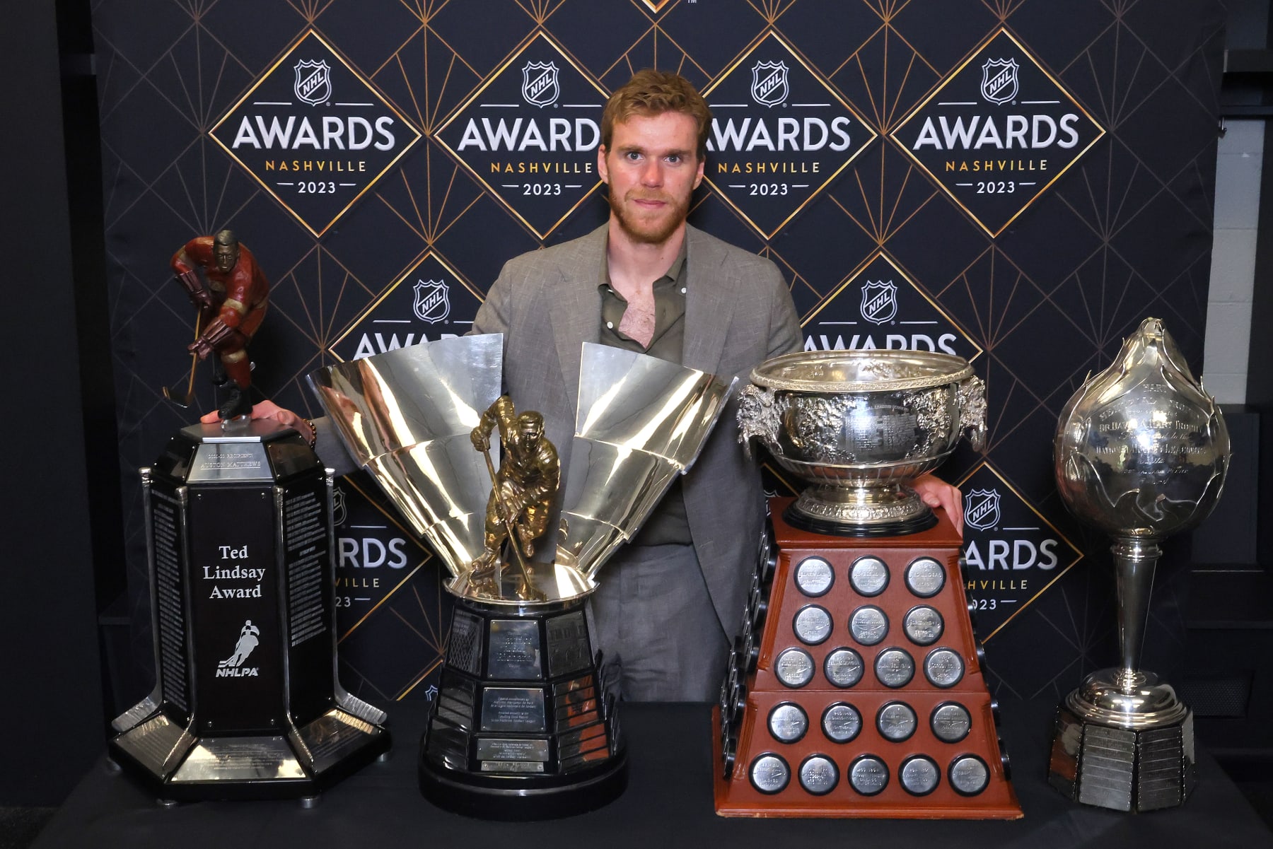 NASHVILLE, TENNESSEE - JUNE 26: Connor McDavid of the Edmonton Oilers poses with the Ted Lindsay Award, Maurice Richard Trophy, Art Ross Trophy and the Hart Trophy during the 2023 NHL Awards at Bridgestone Arena on June 26, 2023 in Nashville, Tennessee. (Photo by Bruce Bennett/Getty Images)