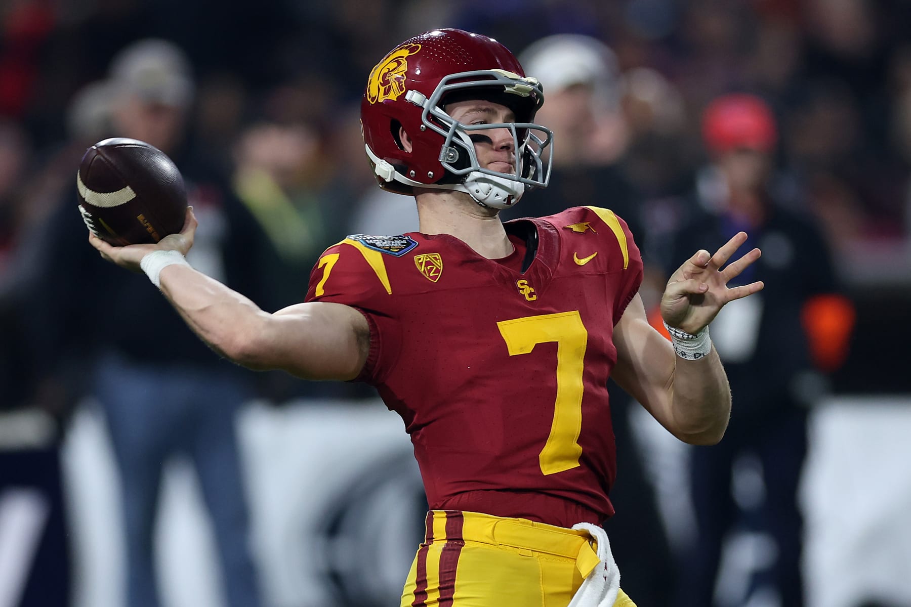 SAN DIEGO, CALIFORNIA - DECEMBER 27: Miller Moss #7 of the USC Trojans passes the ball during the first half of the DIRECTV Holiday Bowl against the Louisville Cardinals at Petco Park on December 27, 2023 in San Diego, California. (Photo by Sean M. Haffey/Getty Images)