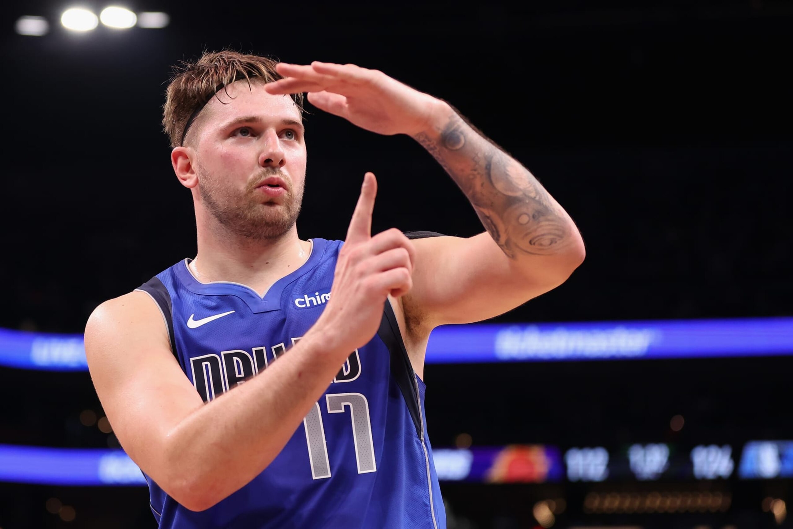 PHOENIX, ARIZONA - DECEMBER 25: Luka Doncic #77 of the Dallas Mavericks reacts to fans during the final moments of the NBA game at Footprint Center on December 25, 2023 in Phoenix, Arizona. The Mavericks defeated the Suns 128-114. NOTE TO USER: User expressly acknowledges and agrees that, by downloading and or using this photograph, User is consenting to the terms and conditions of the Getty Images License Agreement.  (Photo by Christian Petersen/Getty Images)