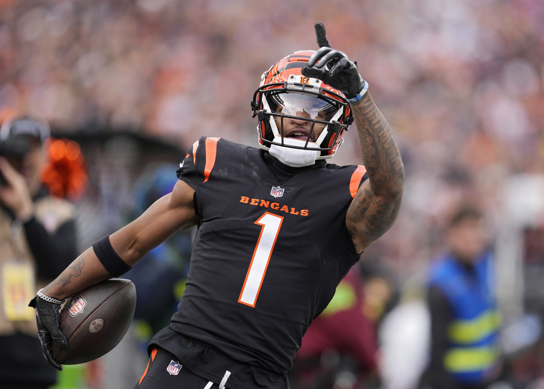 CINCINNATI, OHIO - DECEMBER 16: Ja'Marr Chase #1 of the Cincinnati Bengals reacts after making a catch during a NFL football game against the Minnesota Vikings at Paycor Stadium on December 16, 2023 in Cincinnati, Ohio. (Photo by Jeff Dean/Getty Images)