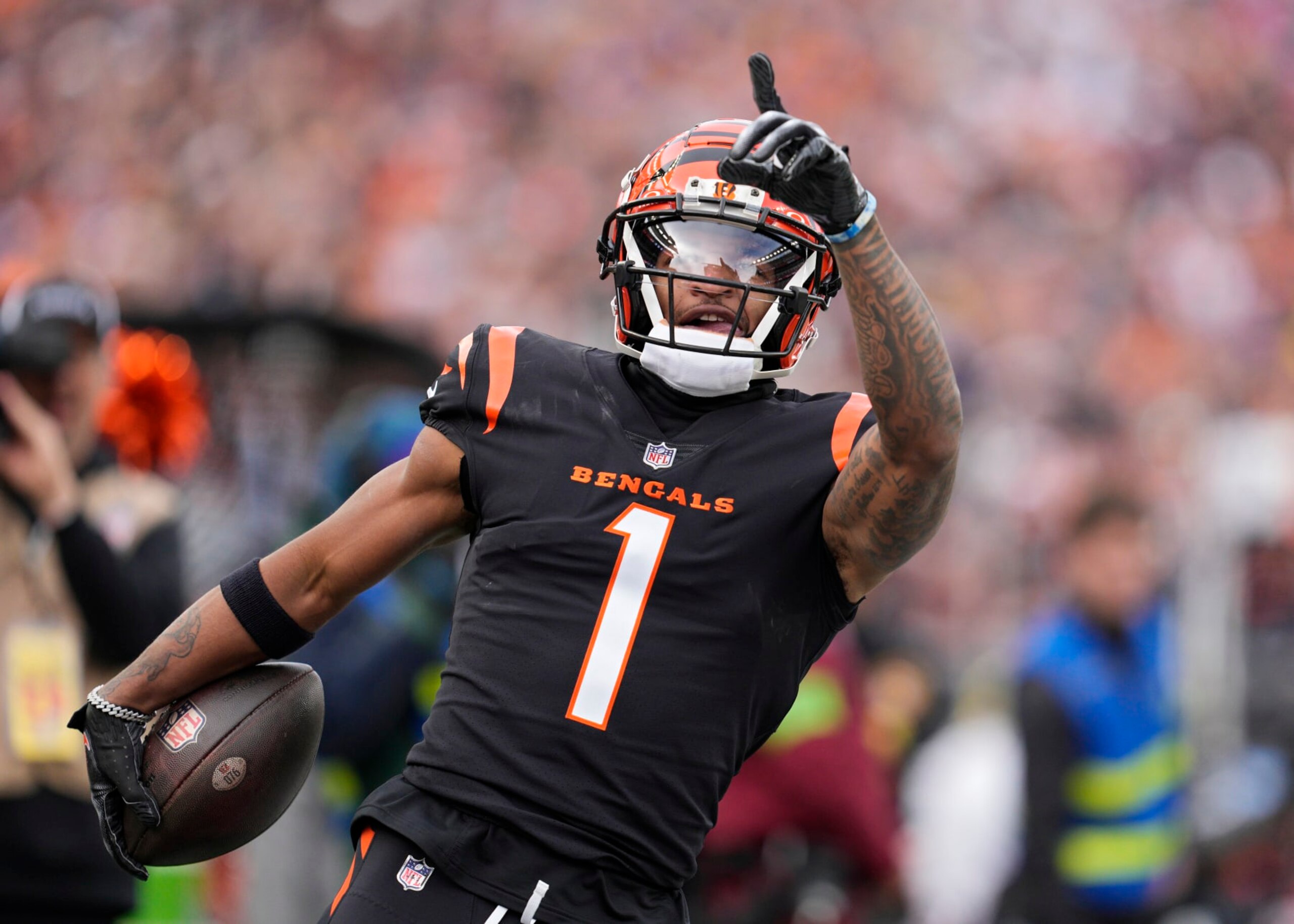 CINCINNATI, OHIO - DECEMBER 16: Ja'Marr Chase #1 of the Cincinnati Bengals reacts after making a catch during a NFL football game against the Minnesota Vikings at Paycor Stadium on December 16, 2023 in Cincinnati, Ohio. (Photo by Jeff Dean/Getty Images)