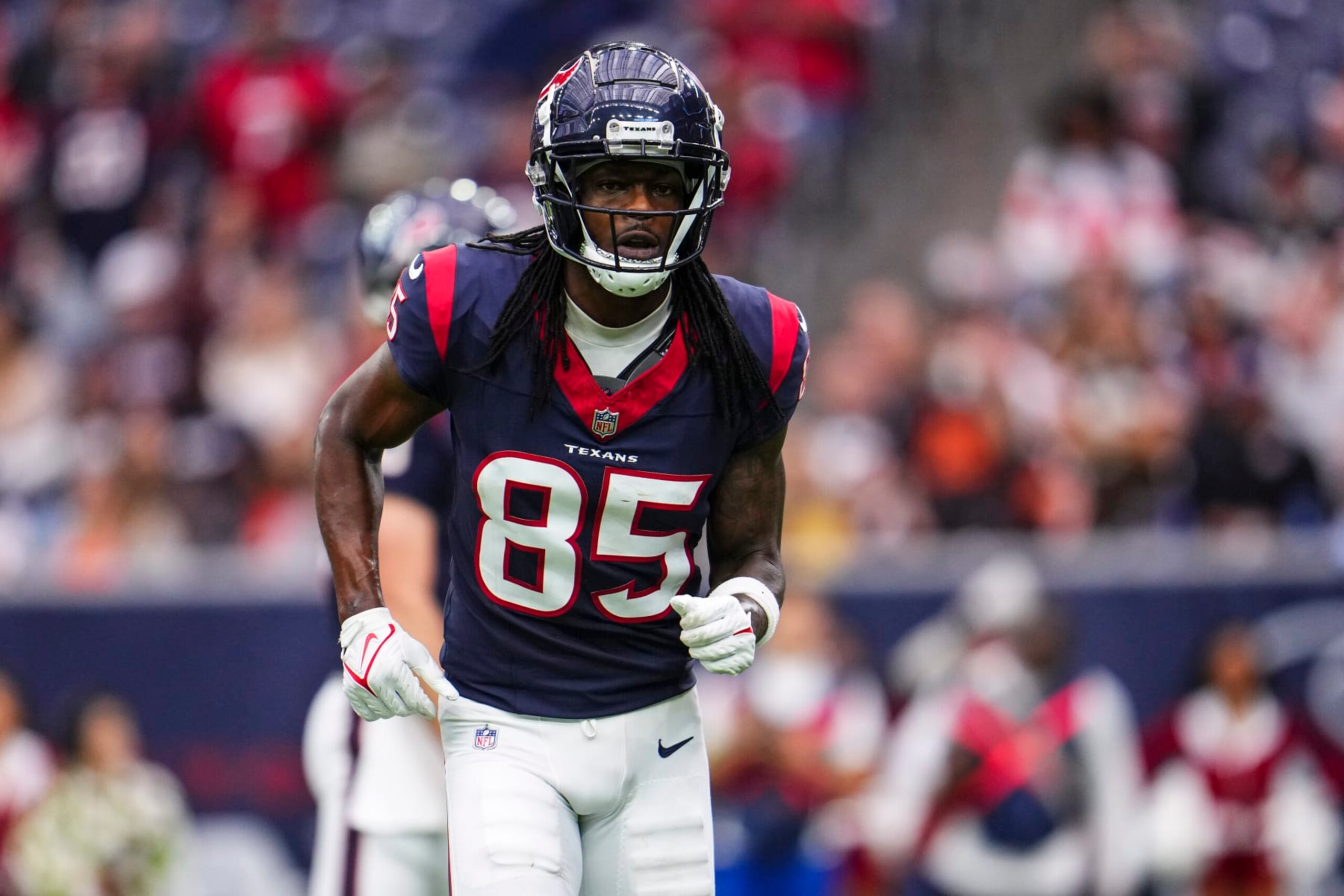 HOUSTON, TX - DECEMBER 24: Noah Brown #85 of the Houston Texans runs across the field during an NFL football game against the Cleveland Browns at NRG Stadium on December 24, 2023 in Houston, Texas. (Photo by Cooper Neill/Getty Images)
