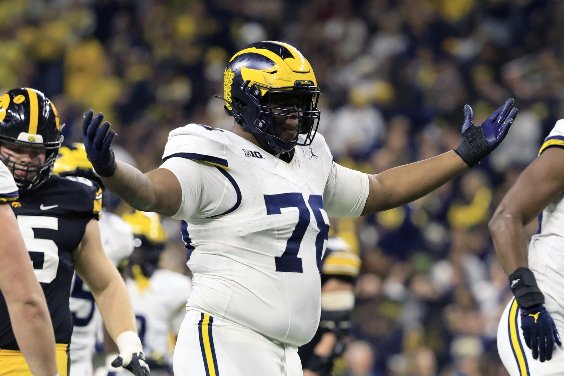 INDIANAPOLIS, INDIANA - DECEMBER 02: Kenneth Grant #78 of the Michigan Wolverines reacts after a play in the game against the Iowa Hawkeyes during the Big Ten Championship at Lucas Oil Stadium on December 02, 2023 in Indianapolis, Indiana. (Photo by Justin Casterline/Getty Images)