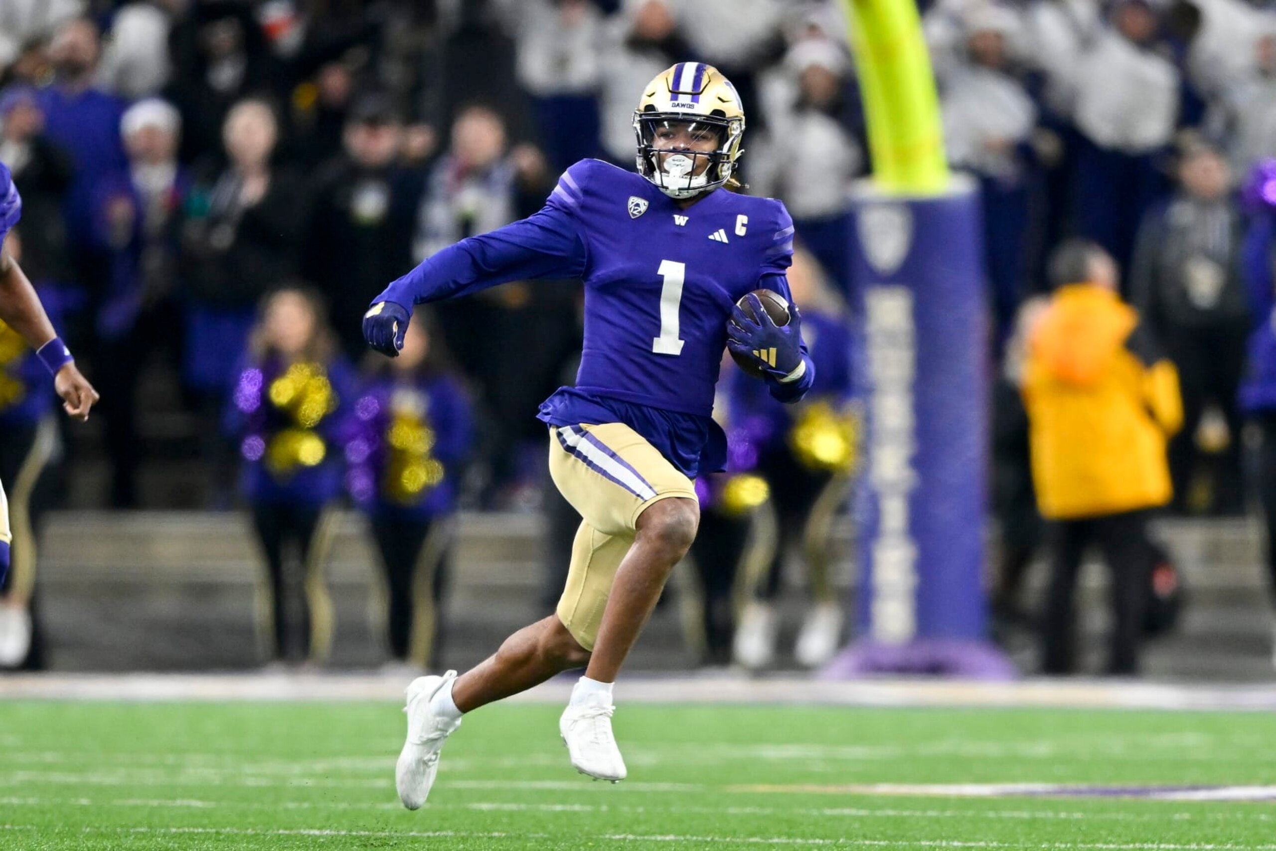 SEATTLE, WASHINGTON - NOVEMBER 25: Rome Odunze #1 of the Washington Huskies runs the ball during the fourth quarter against the Washington State Cougars at Husky Stadium on November 25, 2023 in Seattle, Washington. The Washington Huskies won 24-21. (Photo by Alika Jenner/Getty Images) SEATTLE, WASHINGTON - NOVEMBER 25: Rome Odunze #1 of the Washington Huskies runs the ball during the fourth quarter against the Washington State Cougars at Husky Stadium on November 25, 2023 in Seattle, Washington. The Washington Huskies won 24-21. (Photo by Alika Jenner/Getty Images)