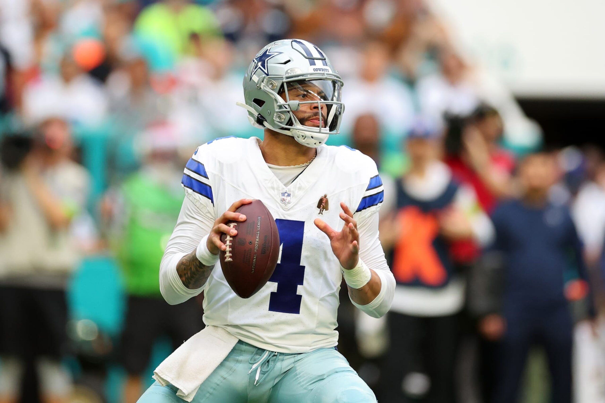 MIAMI GARDENS, FLORIDA - DECEMBER 24: Dak Prescott #4 of the Dallas Cowboys looks to pass during a game against the Miami Dolphins at Hard Rock Stadium on December 24, 2023 in Miami Gardens, Florida.  The Dolphins defeated the Cowboys 22-20. (Photo by Stacy Revere/Getty Images)