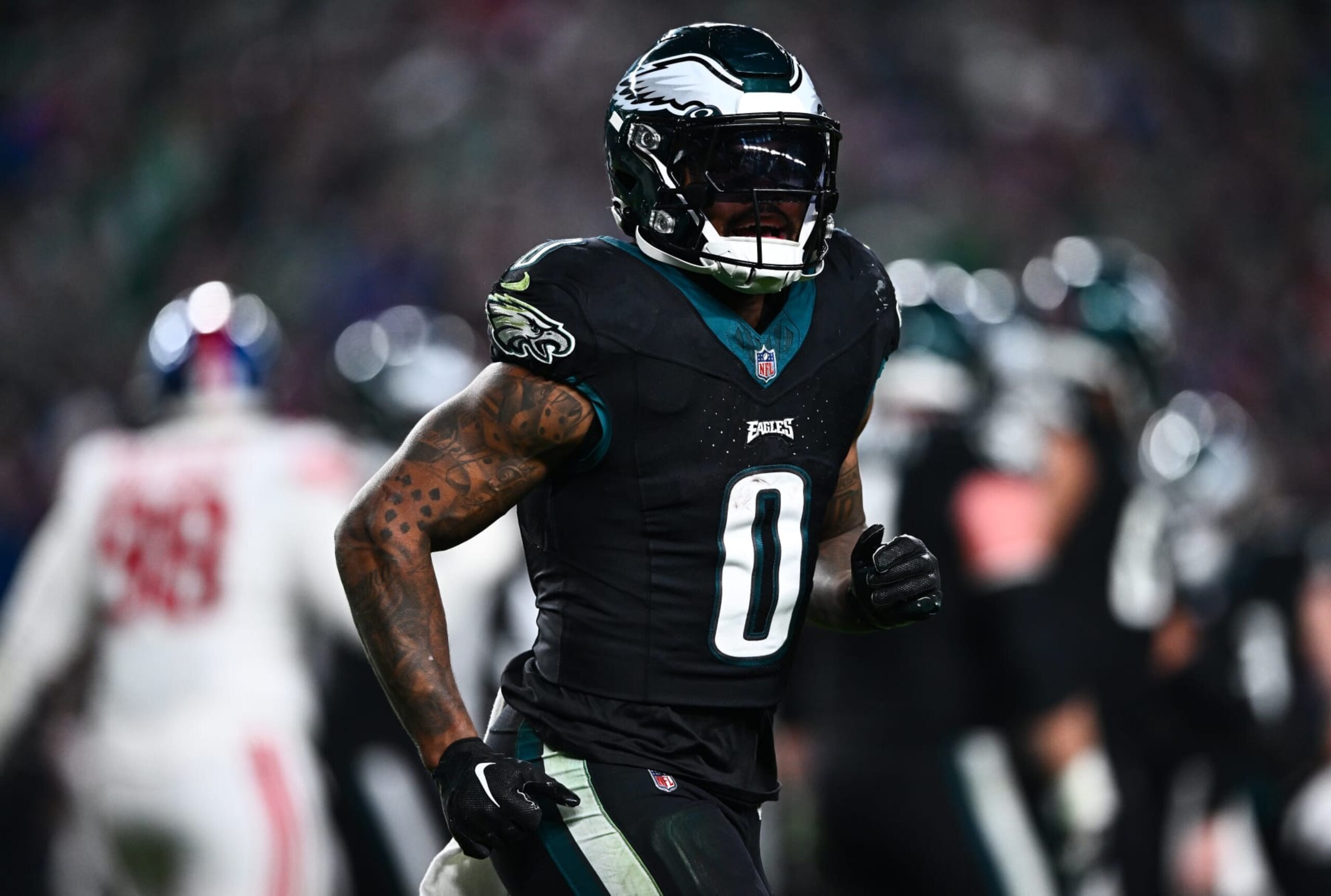 PHILADELPHIA, PA - DECEMBER 25: Philadelphia Eagles Running Back D'Andre Swift (0) reacts after scoring a touchdown in the second half during the game between the New York Giants and Philadelphia Eagles on December 25, 2023 at Lincoln Financial Field in Philadelphia, PA. (Photo by Kyle Ross/Icon Sportswire via Getty Images)