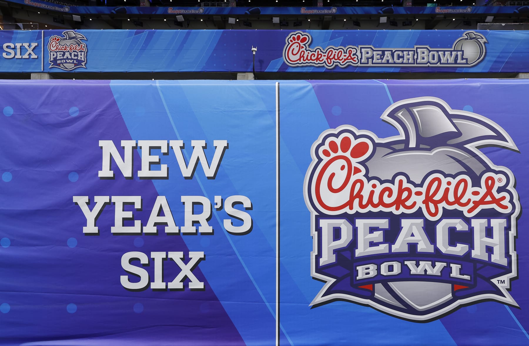 ATLANTA, GEORGIA - DECEMBER 30: A general view of the football field and signage before the Chick-fil-A Peach Bowl at Mercedes-Benz Stadium on December 30, 2023 in Atlanta, Georgia. (Photo by Todd Kirkland/Getty Images)