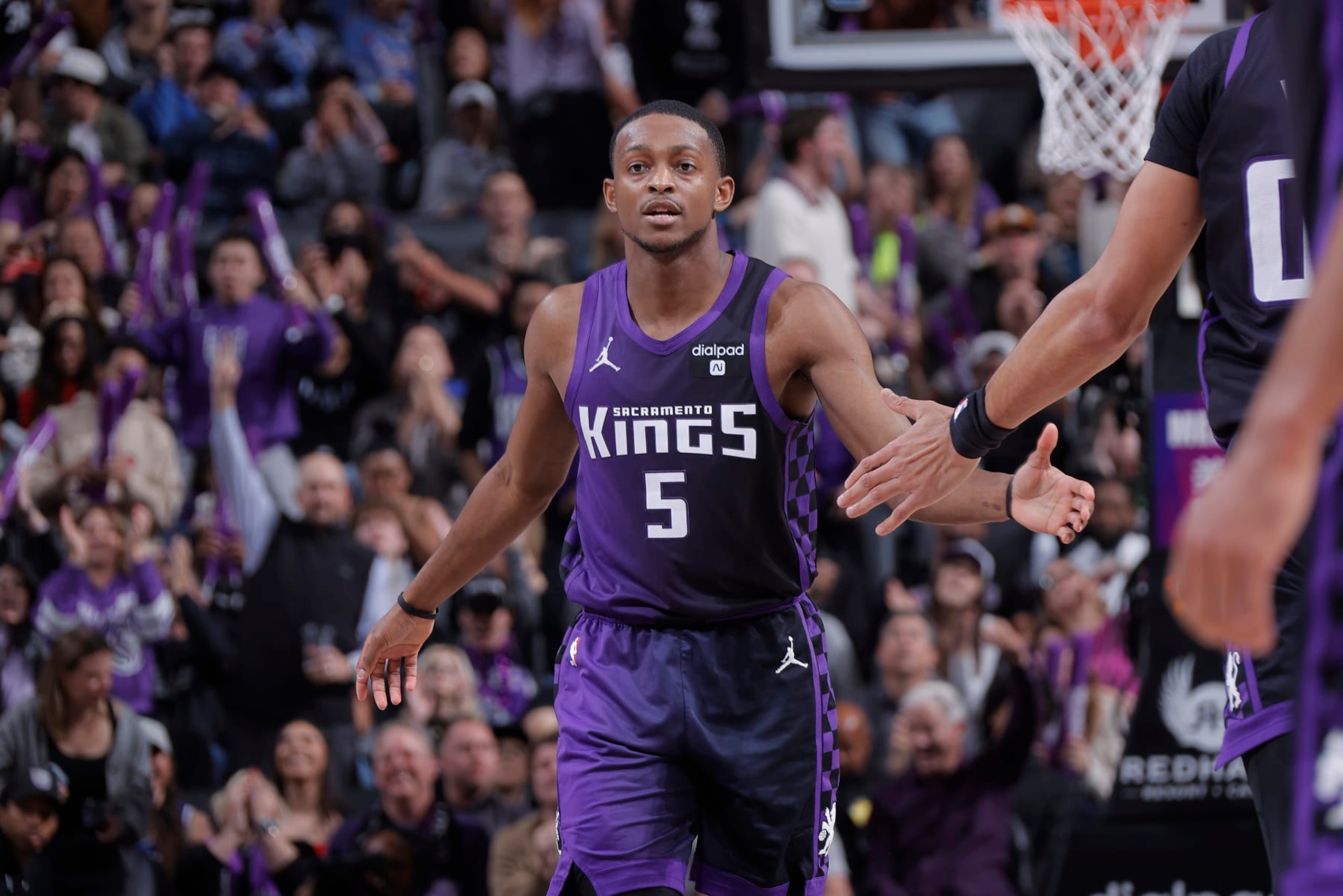 SACRAMENTO, CA - DECEMBER 23: De'Aaron Fox #5 of the Sacramento Kings high fives teammate during the game against the Minnesota Timberwolves on December 23, 2023 at Golden 1 Center in Sacramento, California. NOTE TO USER: User expressly acknowledges and agrees that, by downloading and or using this photograph, User is consenting to the terms and conditions of the Getty Images Agreement. Mandatory Copyright Notice: Copyright 2023 NBAE (Photo by Rocky Widner/NBAE via Getty Images) SACRAMENTO, CA - DECEMBER 23: De'Aaron Fox #5 of the Sacramento Kings high fives teammate during the game against the Minnesota Timberwolves on December 23, 2023 at Golden 1 Center in Sacramento, California. NOTE TO USER: User expressly acknowledges and agrees that, by downloading and or using this photograph, User is consenting to the terms and conditions of the Getty Images Agreement. Mandatory Copyright Notice: Copyright 2023 NBAE (Photo by Rocky Widner/NBAE via Getty Images)