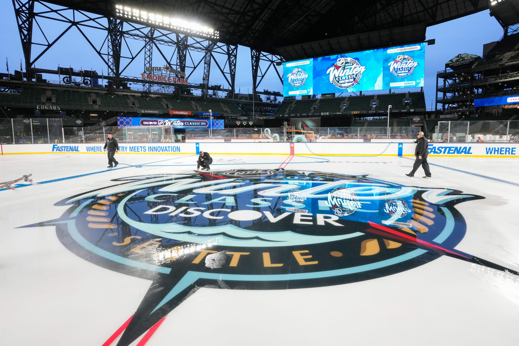SEATTLE, WASHINGTON - DECEMBER 28: The lines and logos are put down in preparation for the 2024 Discover NHL Winter Classic between the Vegas Golden Knights and Seattle Kraken at T-Mobile Park on December 28, 2023 in Seattle, Washington. (Photo by Christopher Mast/NHLI via Getty Images)