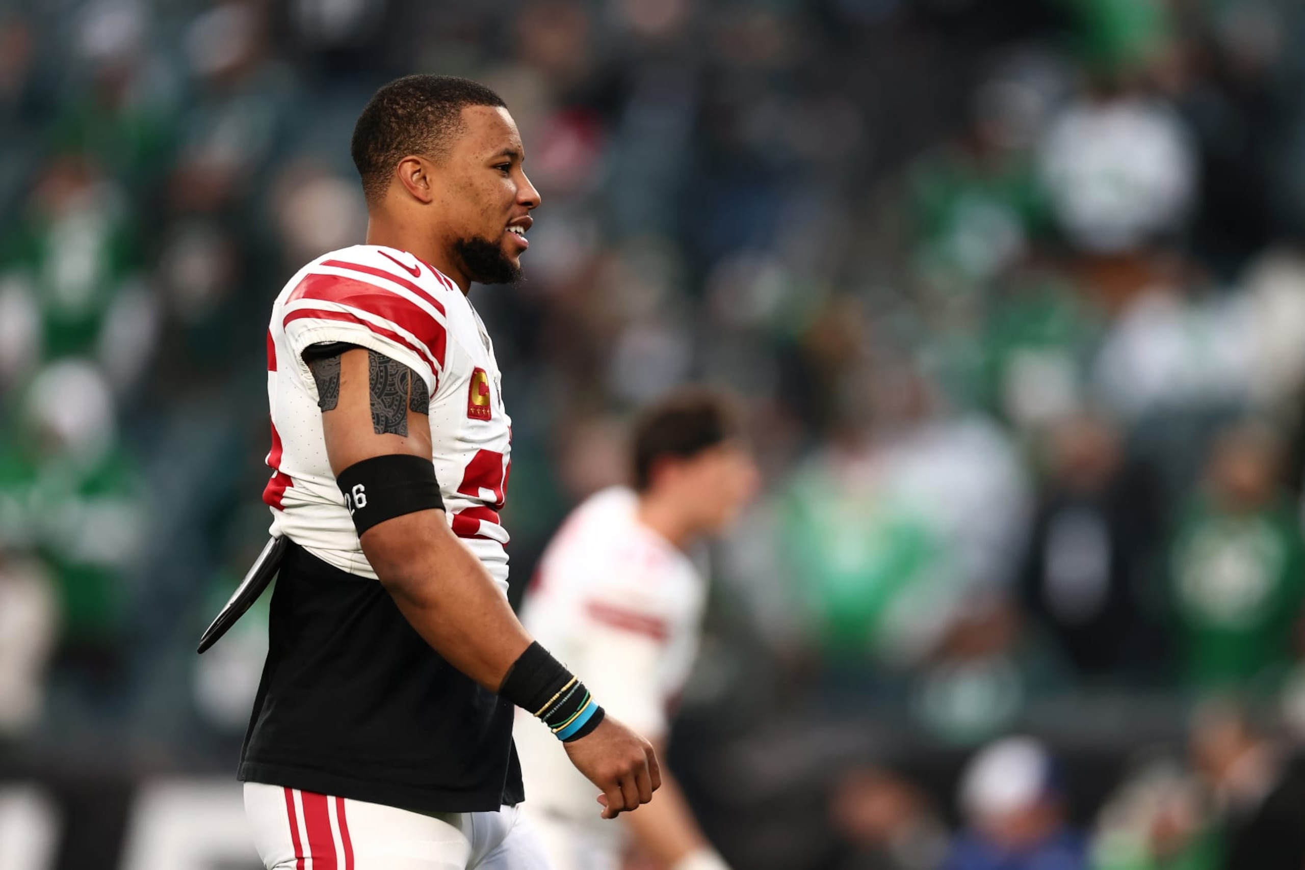 PHILADELPHIA, PENNSYLVANIA - DECEMBER 25: Saquon Barkley #26 of the New York Giants looks on during warm ups prior to the game against the Philadelphia Eagles at Lincoln Financial Field on December 25, 2023 in Philadelphia, Pennsylvania. (Photo by Dustin Satloff/Getty Images) PHILADELPHIA, PENNSYLVANIA - DECEMBER 25: Saquon Barkley #26 of the New York Giants looks on during warm ups prior to the game against the Philadelphia Eagles at Lincoln Financial Field on December 25, 2023 in Philadelphia, Pennsylvania. (Photo by Dustin Satloff/Getty Images)