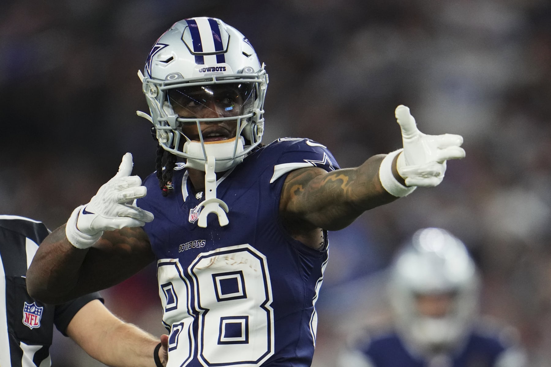 ARLINGTON, TX - DECEMBER 30: CeeDee Lamb #88 of the Dallas Cowboys celebrates after a play against the Detroit Lions during the second half at AT&T Stadium on December 30, 2023 in Arlington, Texas. (Photo by Cooper Neill/Getty Images)