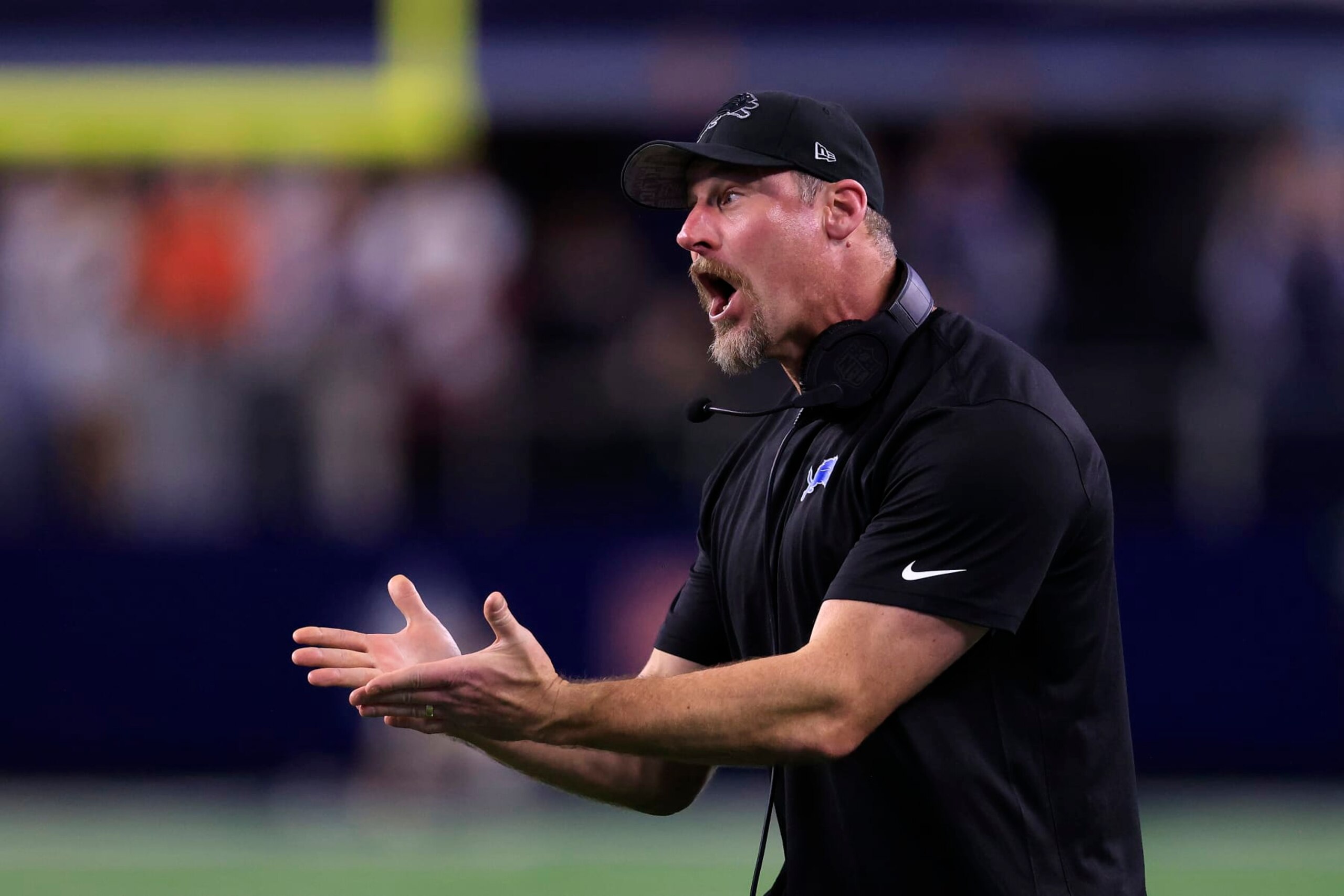 ARLINGTON, TEXAS - DECEMBER 30: Head coach Dan Campbell of the Detroit Lions reacts to a penalty during a two point conversion attempt against the Dallas Cowboys during the fourth quarter in the game at AT&T Stadium on December 30, 2023 in Arlington, Texas. (Photo by Ron Jenkins/Getty Images)