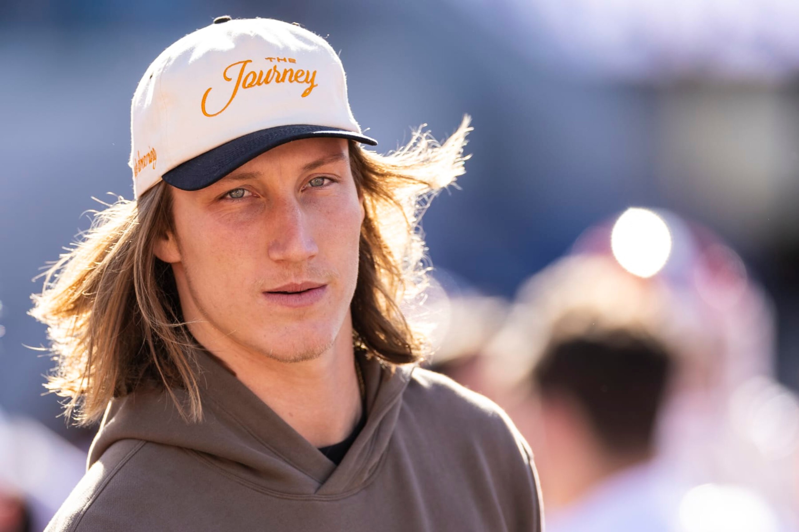 JACKSONVILLE, FLORIDA - DECEMBER 29: NFL Quarterback Trevor Lawrence #16 of the Jacksonville Jaguars looks on from the Clemson Tigers bench during the second half of the TaxSlayer Gator Bowl between the Clemson Tigers and the Kentucky Wildcats at EverBank Stadium on December 29, 2023 in Jacksonville, Florida. (Photo by James Gilbert/Getty Images)