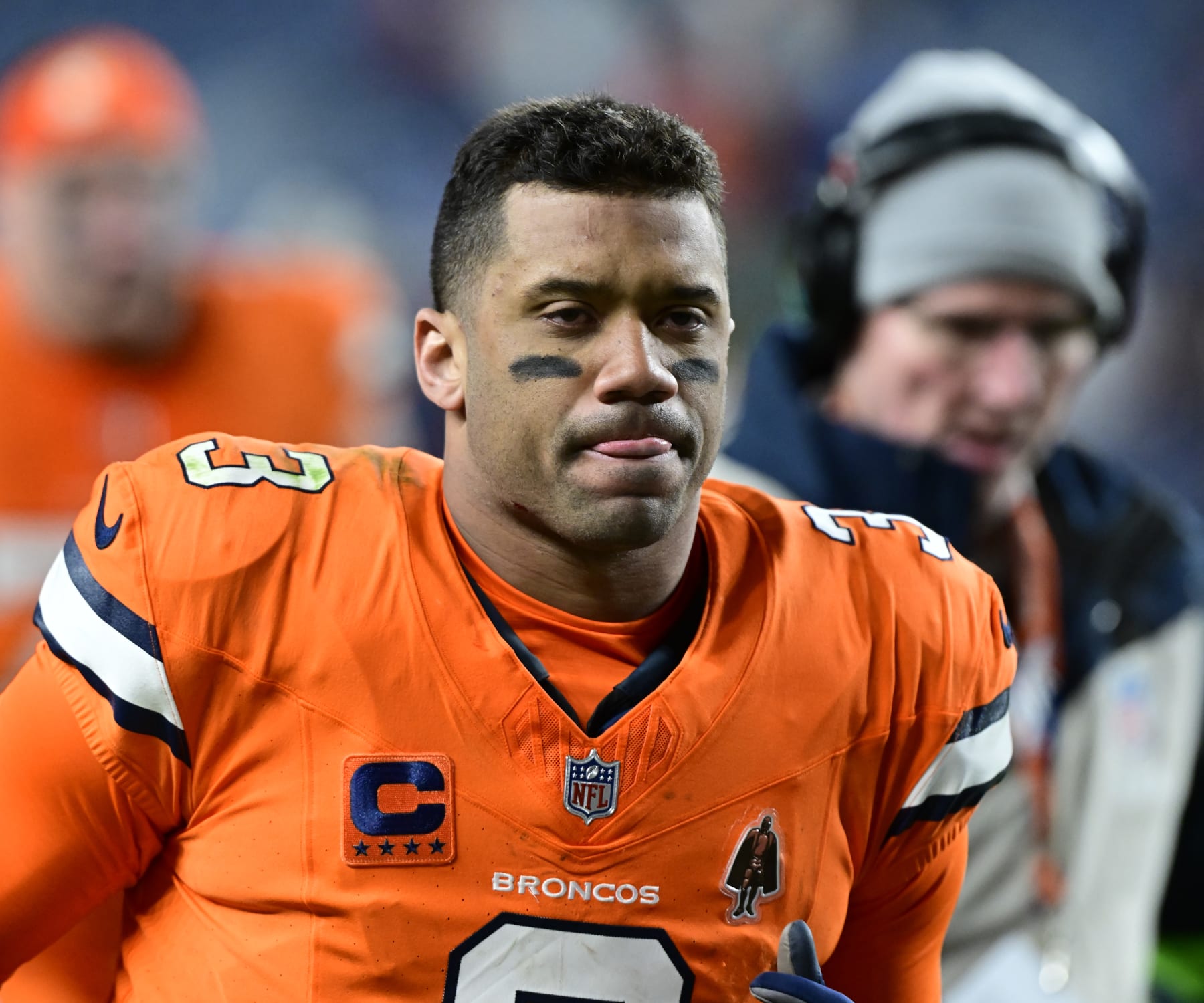 DENVER, CO - DECEMBER 24: Denver Broncos quarterback Russell Wilson (3) comes off the field after losing to the New England Patriots 26-23 at Empower Field at Mile High in Denver, Colorado on Sunday December 24, 2023. (Photo by Andy Cross/MediaNews Group/The Denver Post via Getty Images)
