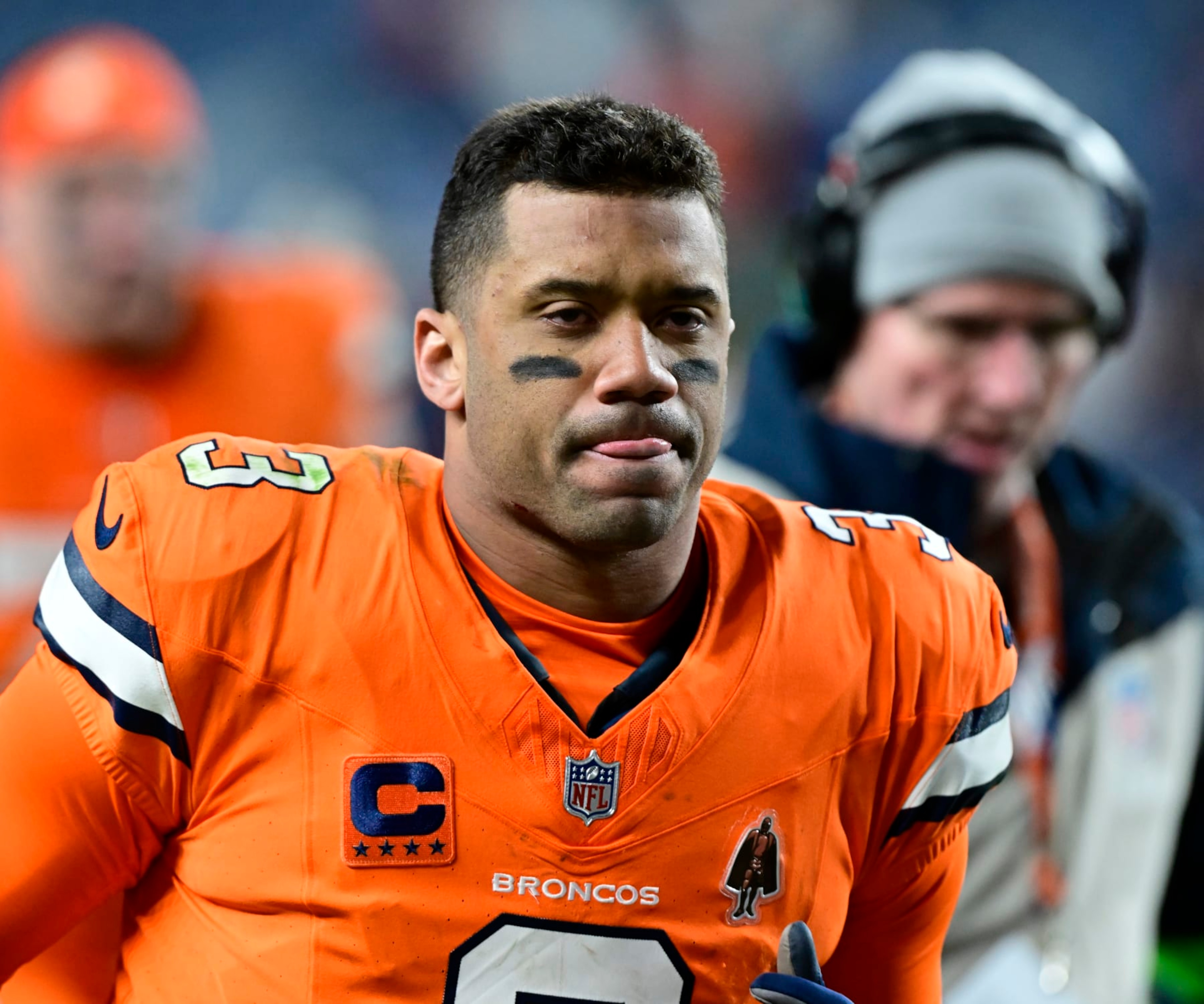 DENVER, CO - DECEMBER 24: Denver Broncos quarterback Russell Wilson (3) comes off the field after losing to the New England Patriots 26-23 at Empower Field at Mile High in Denver, Colorado on Sunday December 24, 2023. (Photo by Andy Cross/MediaNews Group/The Denver Post via Getty Images)