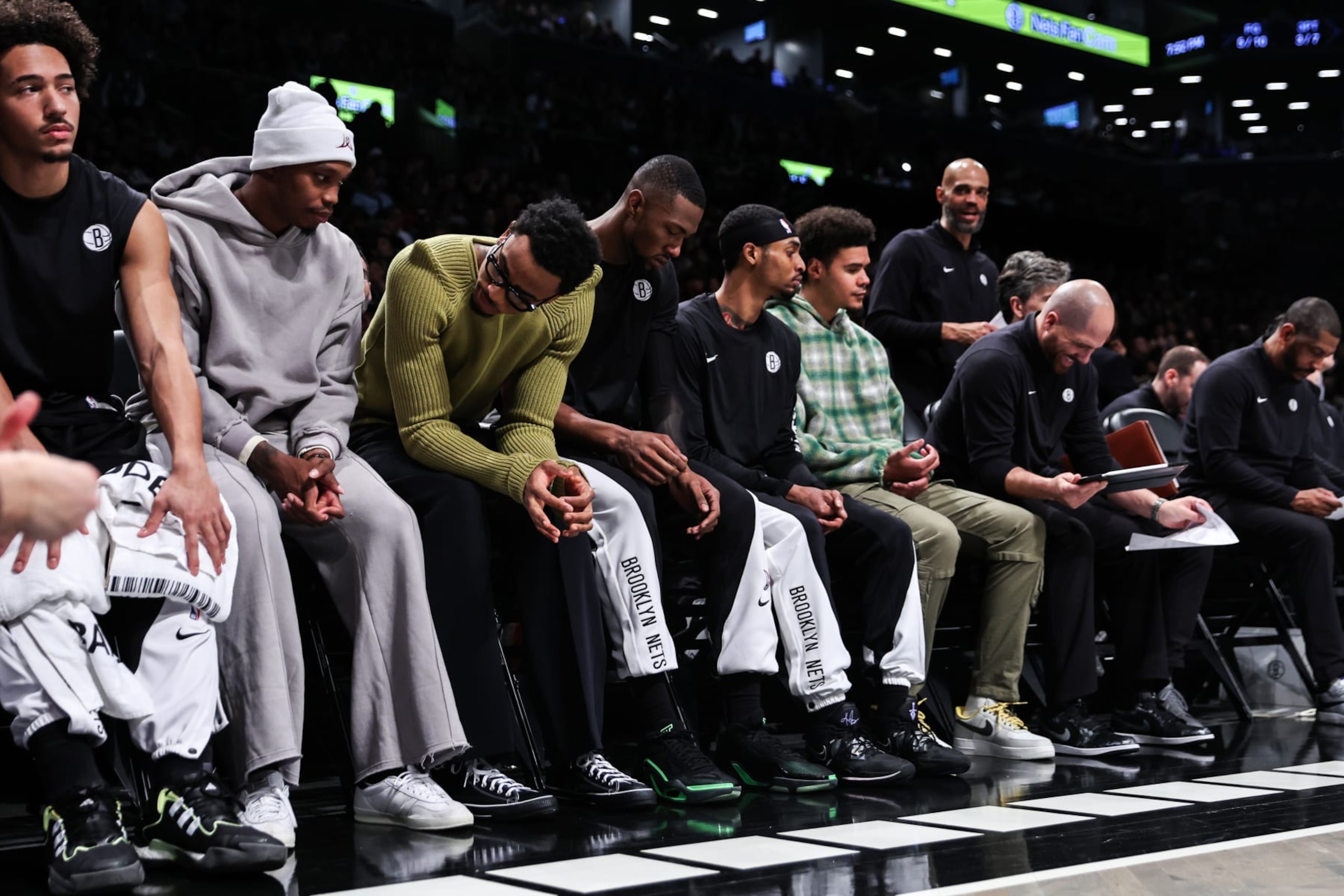 NEW YORK, NEW YORK - DECEMBER 27: Brooklyn Nets players watch from the bench during the first quarter against the Milwaukee Bucks at Barclays Center on December 27, 2023 in New York City. NOTE TO USER: User expressly acknowledges and agrees that, by downloading and or using this photograph, User is consenting to the terms and conditions of the Getty Images License Agreement. (Photo by Dustin Satloff/Getty Images)