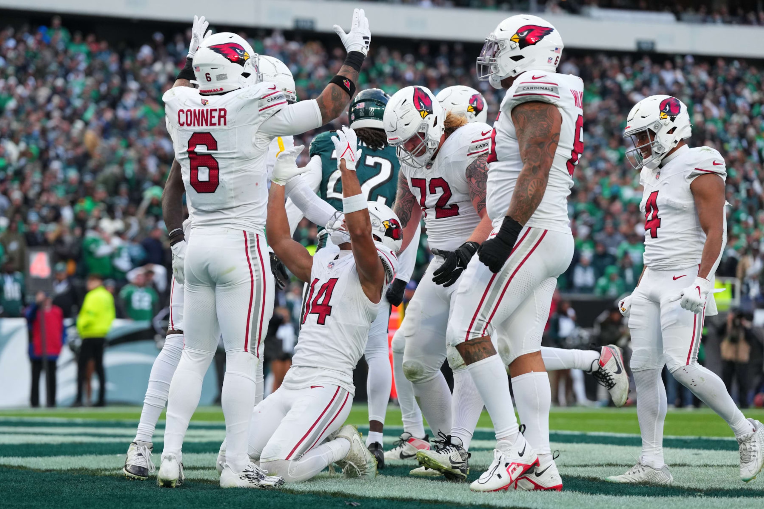 PHILADELPHIA, PENNSYLVANIA - DECEMBER 31: Michael Wilson #14 of the Arizona Cardinals celebrates with teammates after a touchdown catch during the fourth quarter against the Philadelphia Eagles at Lincoln Financial Field on December 31, 2023 in Philadelphia, Pennsylvania. (Photo by Mitchell Leff/Getty Images)