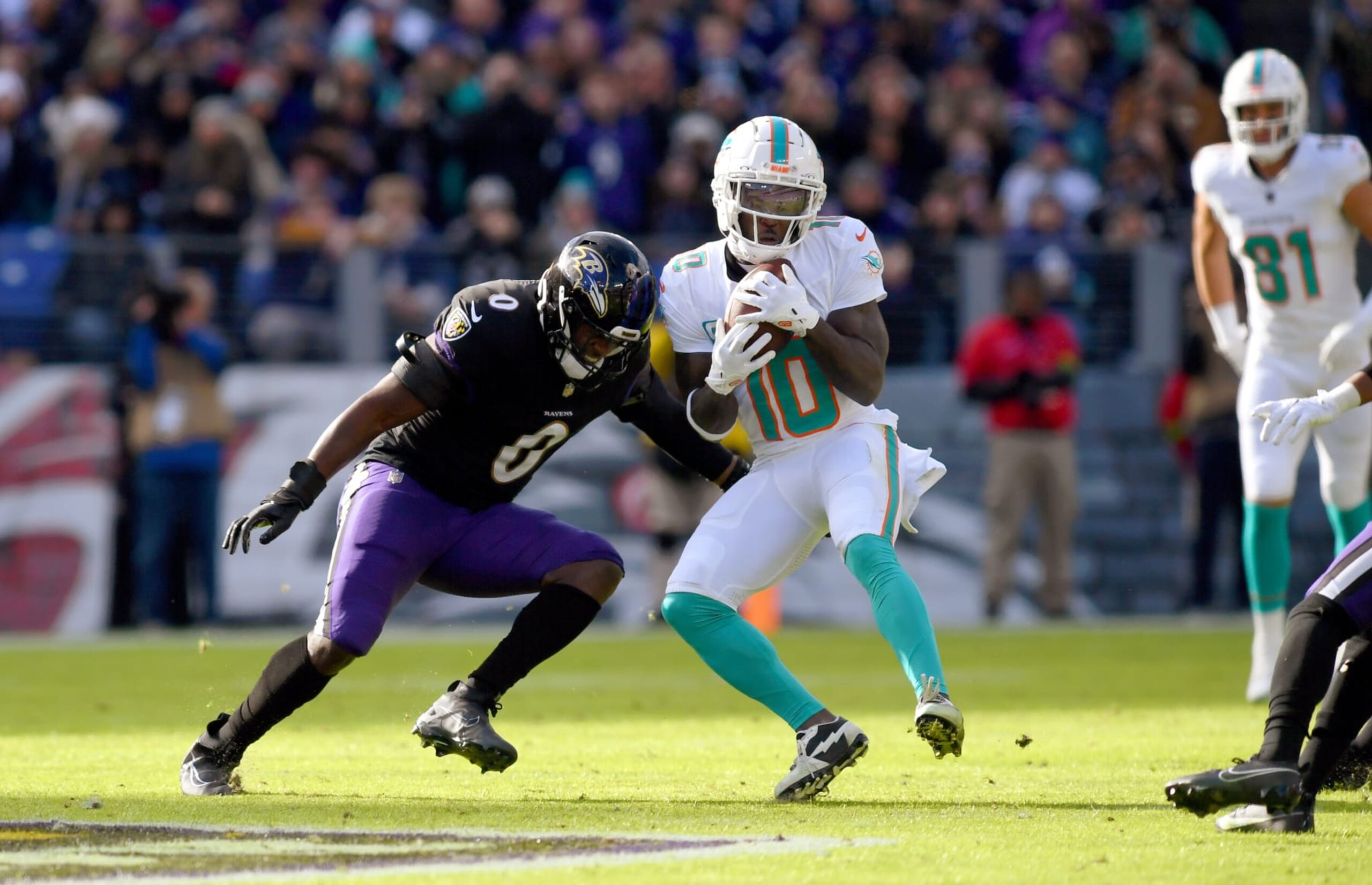 BALTIMORE, MD - DECEMBER 31: Miami Dolphins wide receiver Tyreek Hill (10) makes his second catch of the game to put him over 10,000 receiving yards for his career during the Miami Dolphins versus Baltimore Ravens NFL game at M&T Bank Stadium on December 31, 2023 in Baltimore, MD. (Photo by Randy Litzinger/Icon Sportswire via Getty Images)