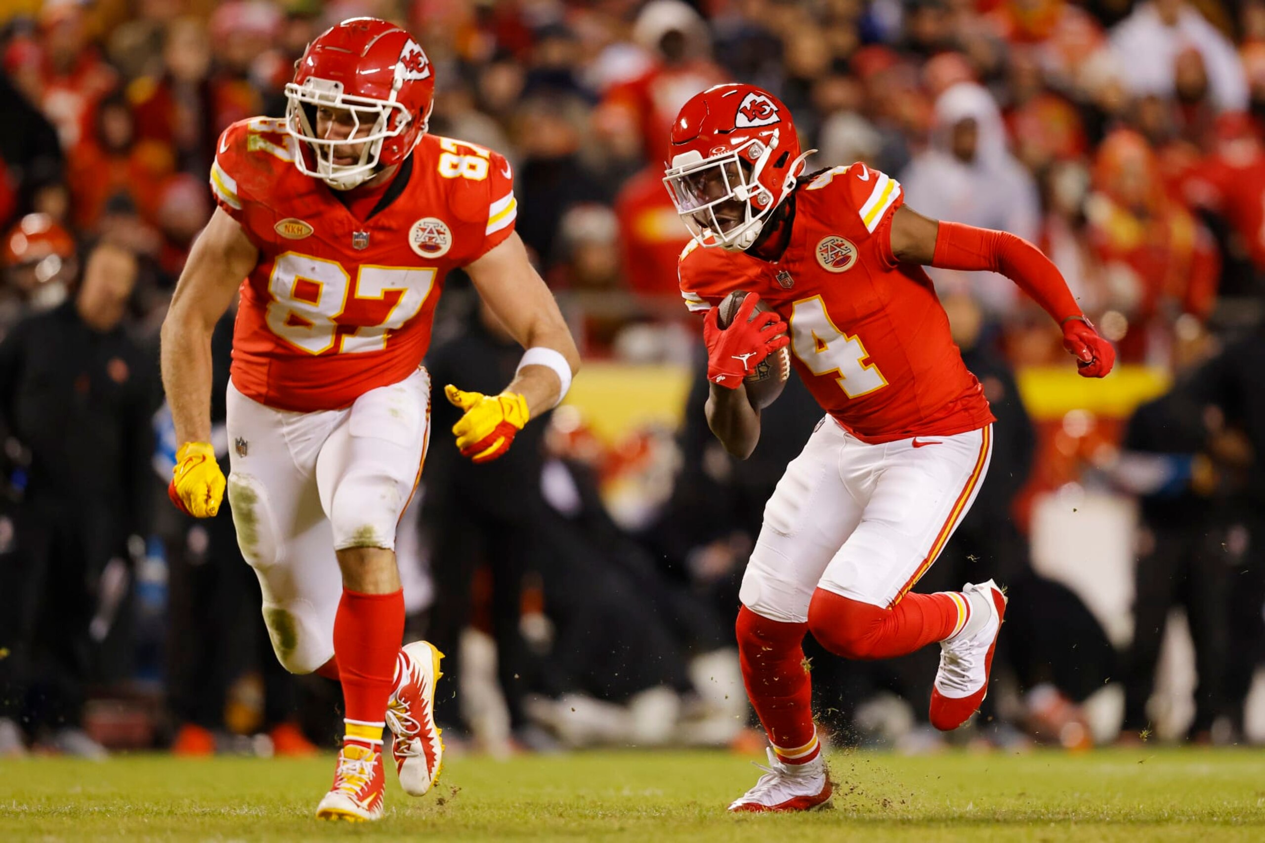 KANSAS CITY, MISSOURI - DECEMBER 31: Rashee Rice #4 of the Kansas City Chiefs runs with the ball during the third quarter against the Cincinnati Bengals at GEHA Field at Arrowhead Stadium on December 31, 2023 in Kansas City, Missouri. (Photo by David Eulitt/Getty Images)