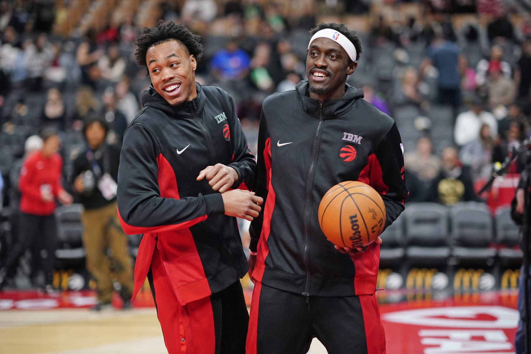 TORONTO, CANADA - DECEMBER 18: Scottie Barnes #4 and Pascal Siakam #43 of the Toronto Raptors smile before the game against the Charlotte Hornets on December 18, 2023 at the Scotiabank Arena in Toronto, Ontario, Canada.  NOTE TO USER: User expressly acknowledges and agrees that, by downloading and or using this Photograph, user is consenting to the terms and conditions of the Getty Images License Agreement.  Mandatory Copyright Notice: Copyright 2023 NBAE (Photo by Mark Blinch/NBAE via Getty Images)