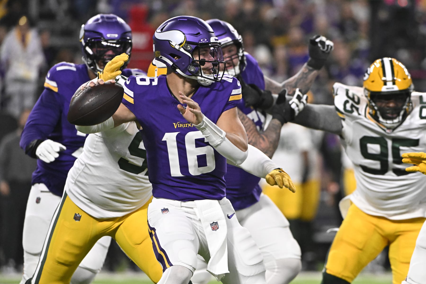 MINNEAPOLIS, MINNESOTA - DECEMBER 31: Jaren Hall #16 of the Minnesota Vikings looks to pass during the first quarter against the Green Bay Packers at U.S. Bank Stadium on December 31, 2023 in Minneapolis, Minnesota. (Photo by Stephen Maturen/Getty Images)
