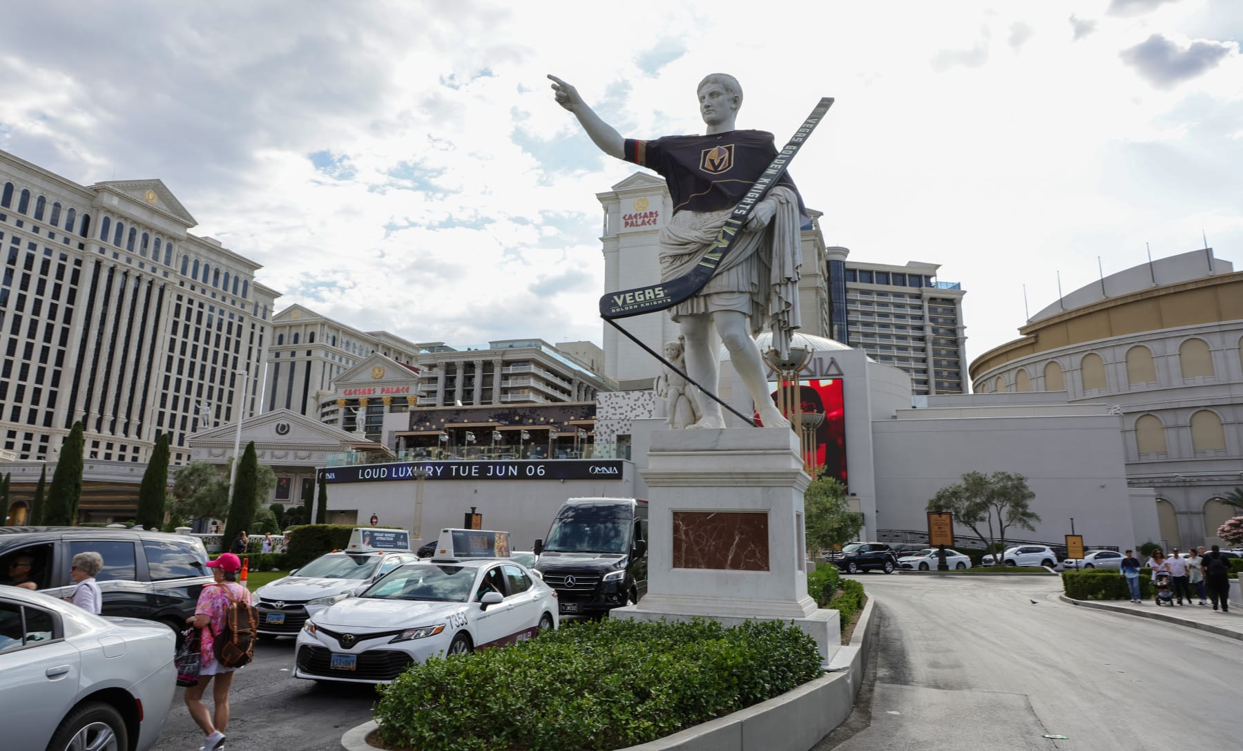 LAS VEGAS, NEVADA - JUNE 01: A statue of Julius Caesar in front of Caesars Palace on the Las Vegas Strip wears a Vegas Golden Knights jersey and displays an oversized hockey stick with the team logo on it in support of the NHL team's 2023 NHL Stanley Cup Final run on June 01, 2023 in Las Vegas, Nevada. Game One of the 2023 NHL Stanley Cup Final between the Golden Knights and the Florida Panthers is on June 03 in Las Vegas. (Photo by Ethan Miller/Getty Images)