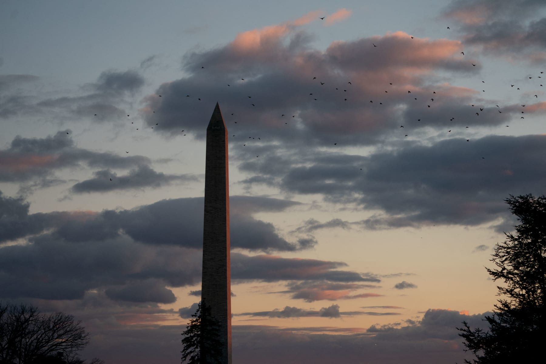 The Washington Monument is seen at sunset from the South Lawn of the White House in Washington, DC, on December 6, 2023. (Photo by Stefani Reynolds / AFP) (Photo by STEFANI REYNOLDS/AFP via Getty Images)
