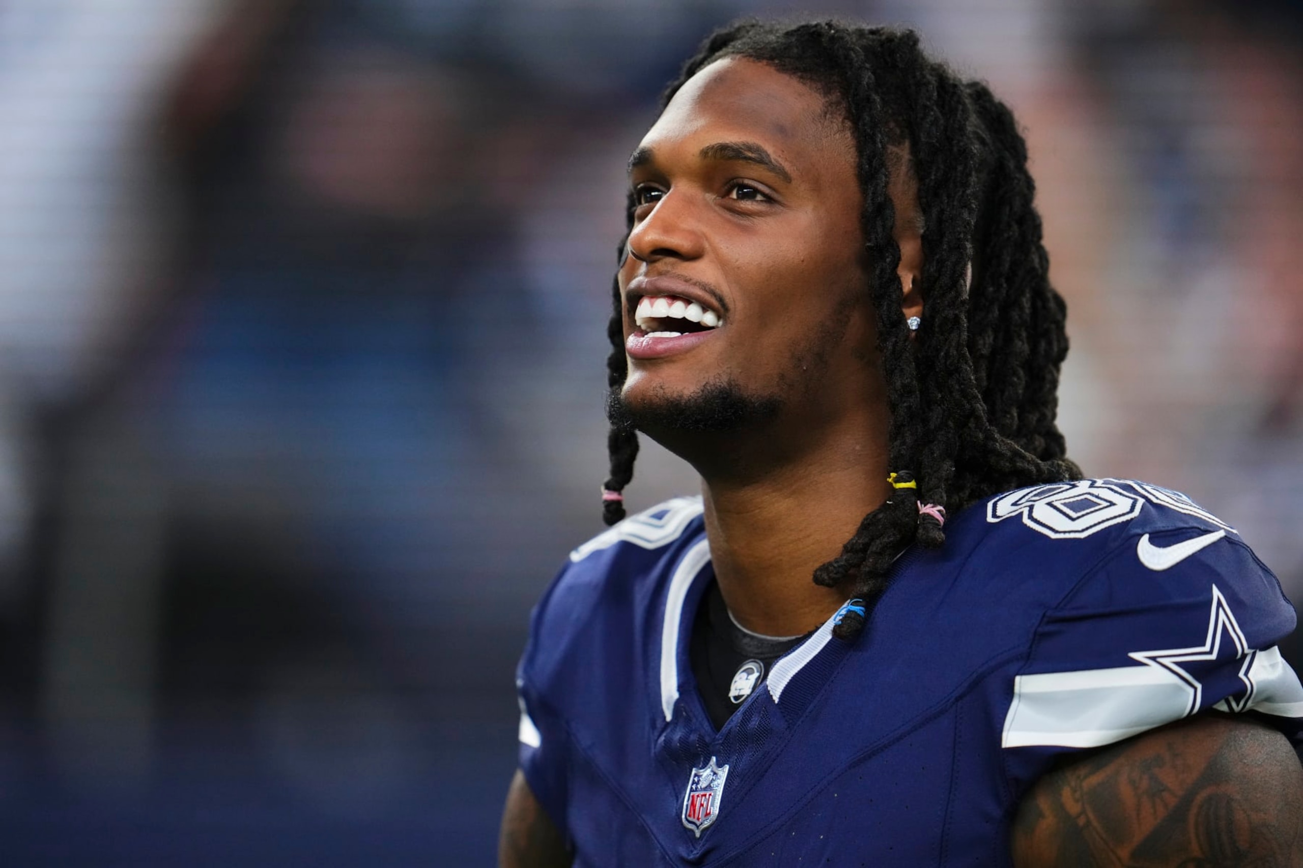 ARLINGTON, TX - DECEMBER 30: CeeDee Lamb #88 of the Dallas Cowboys looks on before kickoff against the Detroit Lions at AT&T Stadium on December 30, 2023 in Arlington, Texas. (Photo by Cooper Neill/Getty Images)